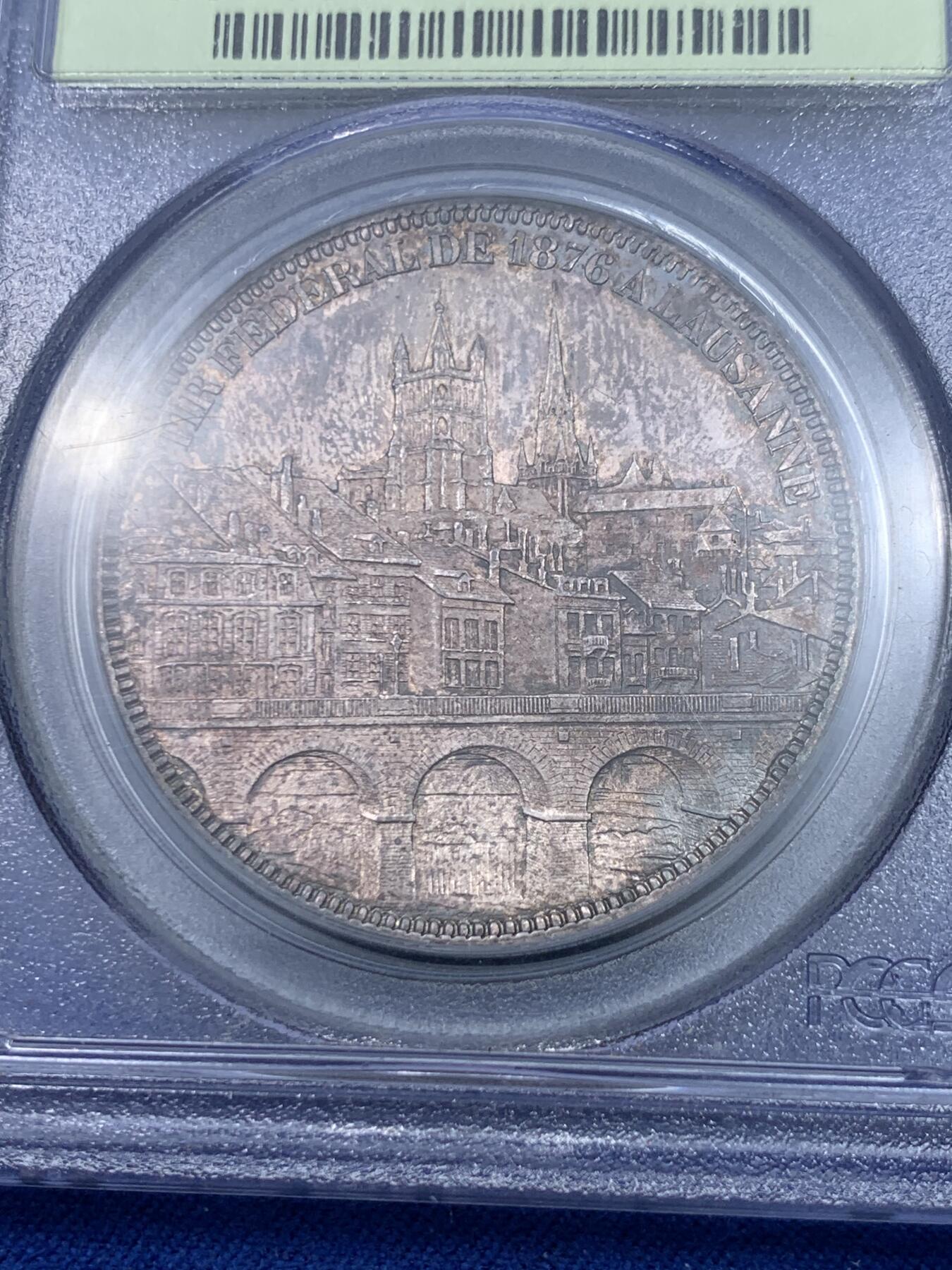 《竞宝斋》立夏专场特拍 （第2-1场）全场顺丰包邮 265场 PCGS MS63 瑞士1876年洛桑射击节5法郎银币 PCGS经典绿标 现在这种盒子市面上已经绝迹 老盒低评 64分状态 人物景观细节俱在