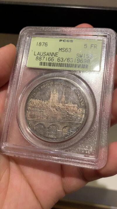 《竞宝斋》立夏专场特拍 （第2-1场）全场顺丰包邮 265场 PCGS MS63 瑞士1876年洛桑射击节5法郎银币 PCGS经典绿标 现在这种盒子市面上已经绝迹 老盒低评 64分状态 人物景观细节俱在