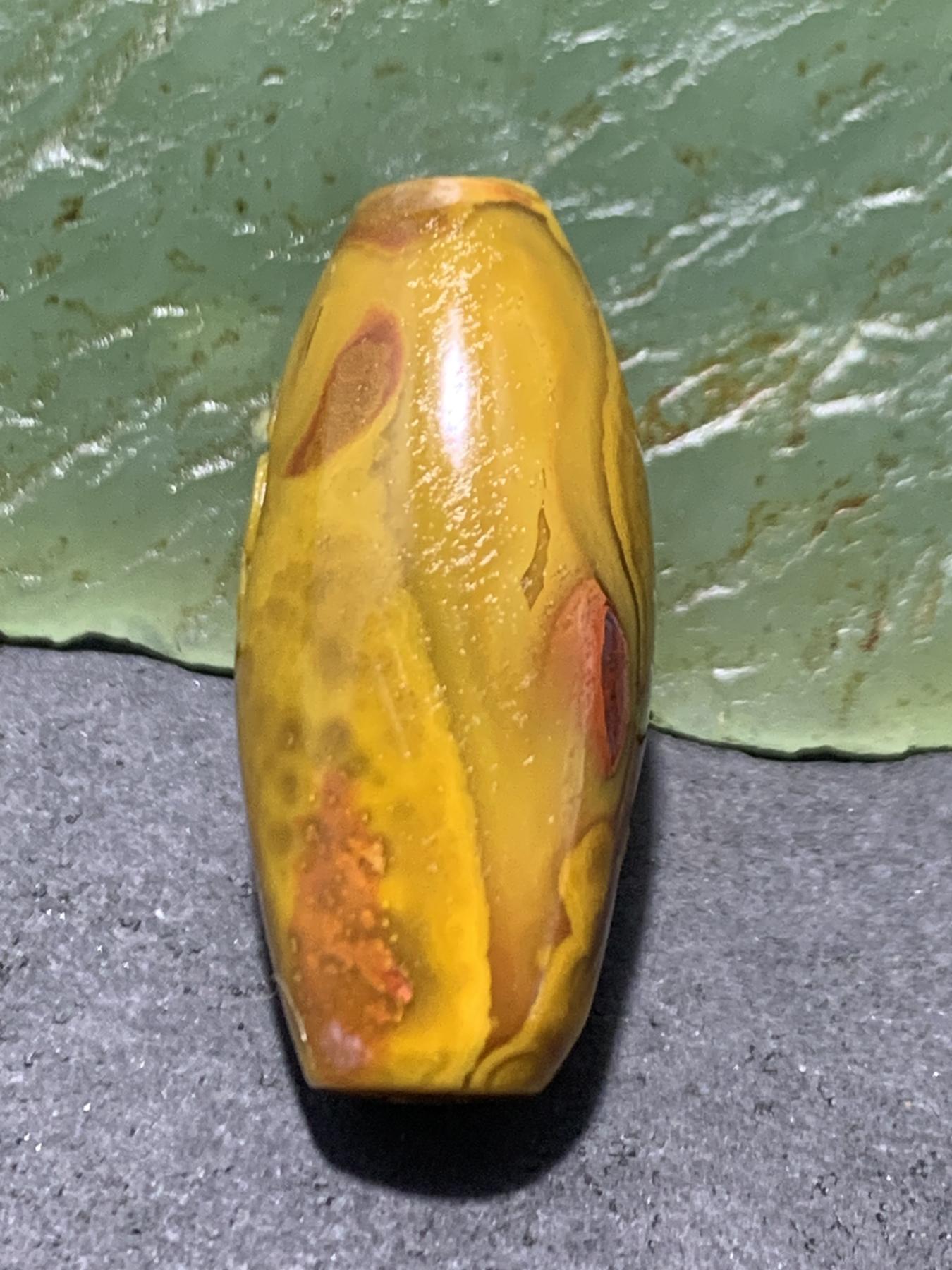 精美亚光战国红玛瑙巧雕金鲤鱼莲花桶珠一个，