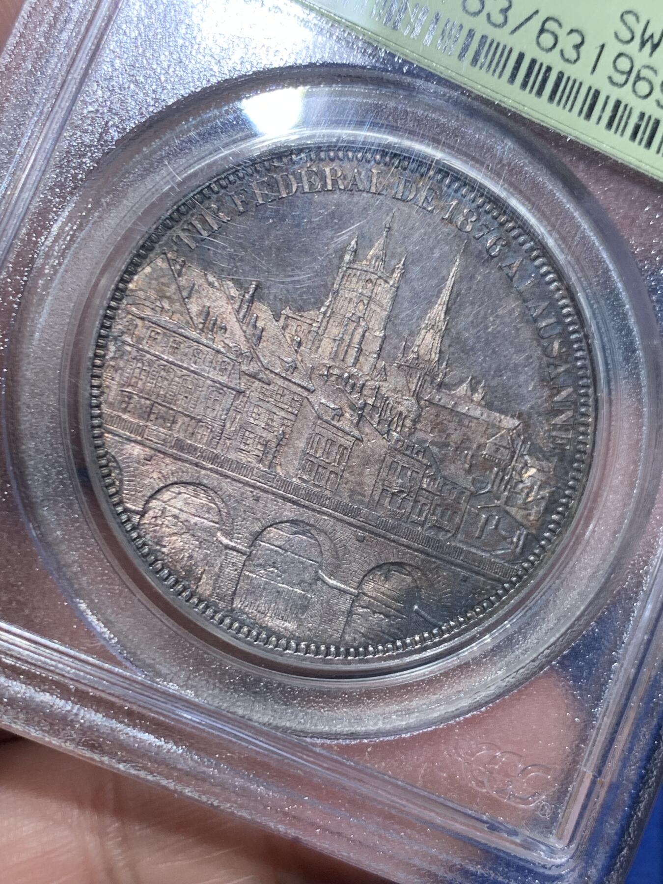 《竞宝斋》立夏专场特拍 （第2-1场）全场顺丰包邮 265场 PCGS MS63 瑞士1876年洛桑射击节5法郎银币 PCGS经典绿标 现在这种盒子市面上已经绝迹 老盒低评 64分状态 人物景观细节俱在