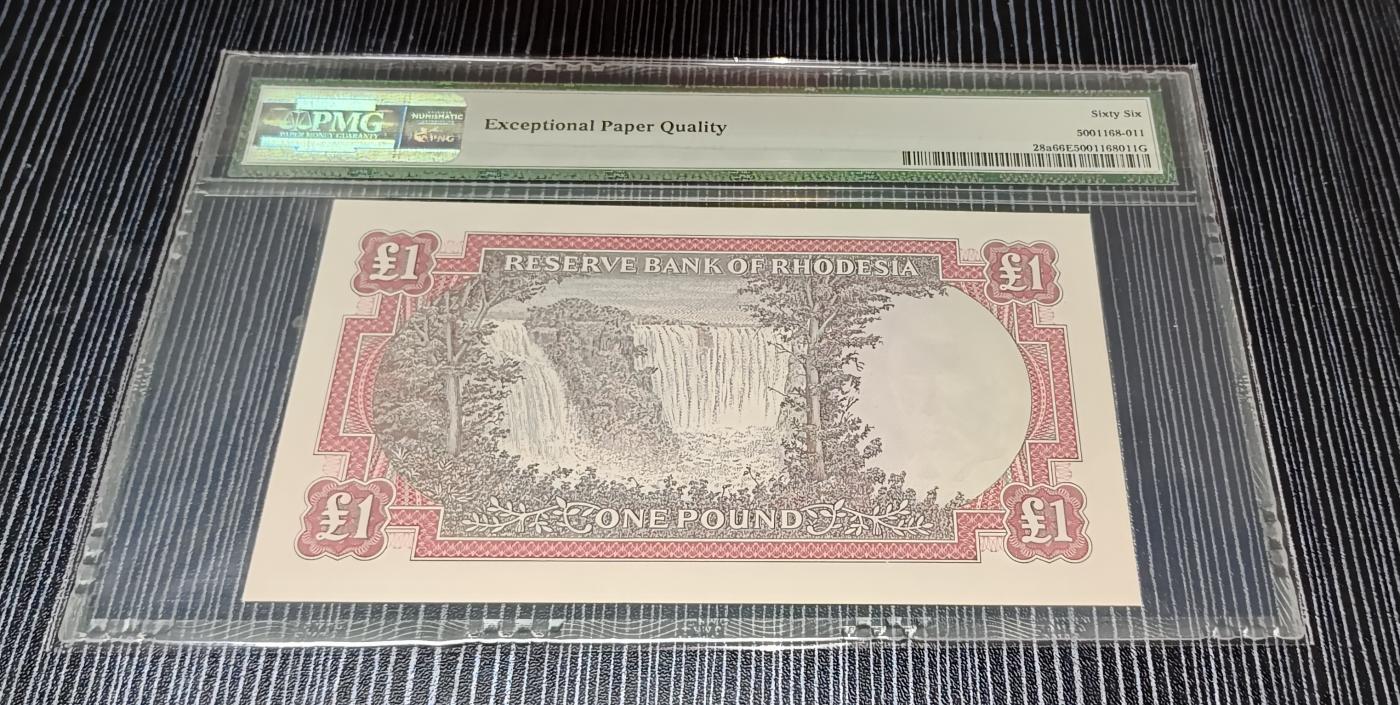 Chase Auction 第29期 - - 邮票、银币、外钞、民国钞和人民币混合场！（持续更新中） 1966年罗德利亚1镑，PMG66！