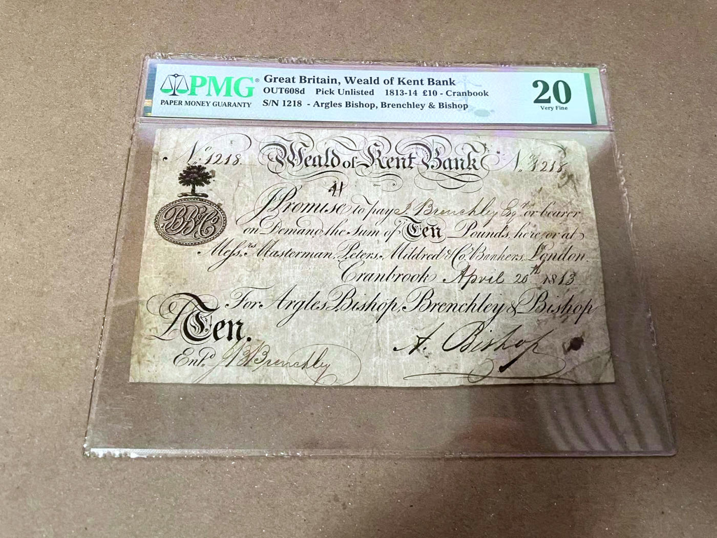 【Blue Auction】✨世界纸币精拍第471期【精】 【1218号实钞】英国 肯特郡Weald银行（仅存在2年） 早期1813-14年10镑高值 200多年前白色英镑 大票幅 PMG20 已经是难得的品相了 肯特被称为“英格兰的花园”，是狄更斯、达尔文和丘吉尔的故乡 几年前目录价250-400英镑