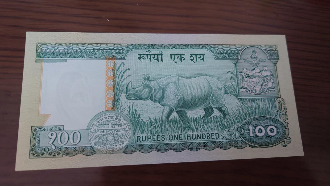 【世界钱币】精选微拍第103期暨2024年第14期  部分卖剩新品展示 1981年尼泊尔100 全新绝品 无金属线版