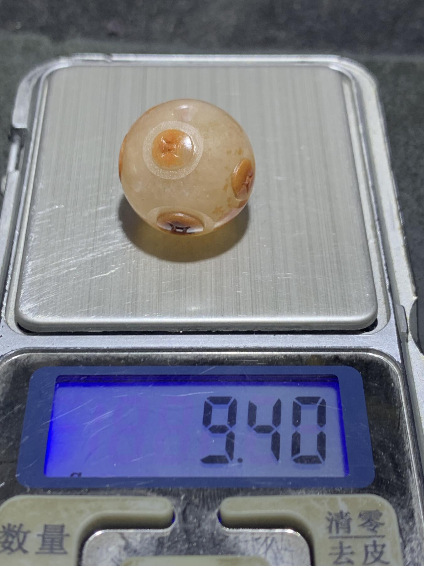 精美冰飘战国红玛瑙手工俏色巧雕钱币圆珠一个，