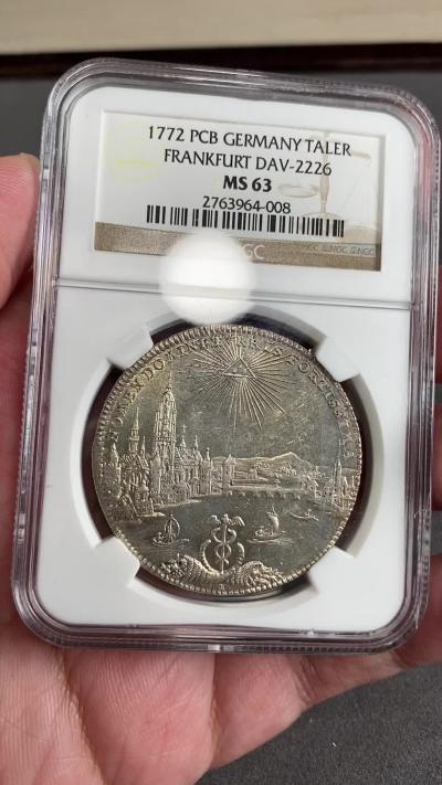 万国钱币拍卖第025期（槐月至·百币艳） NGC MS63 1772年德国法兰克福城市景观1泰勒大银 非常经典的法兰克福河景，双面皆带有一些PL质感，底光充沛，打制上乘，高质量的景观泰勒在外拍也是一币难求的存在，此枚品相一步到位，泰勒玩家不容错过。