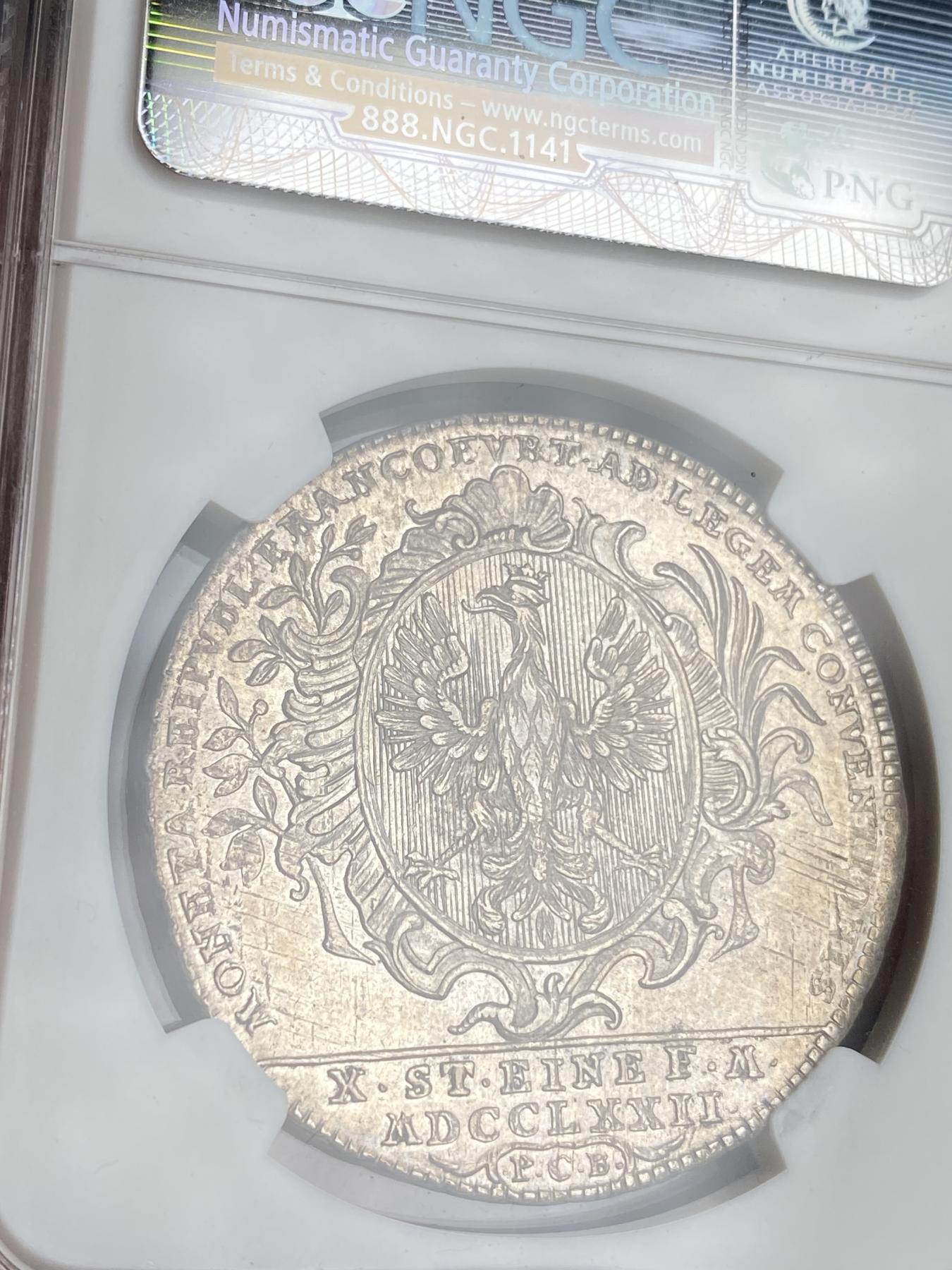 万国钱币拍卖第025期（槐月至·百币艳） NGC MS63 1772年德国法兰克福城市景观1泰勒大银 非常经典的法兰克福河景，双面皆带有一些PL质感，底光充沛，打制上乘，高质量的景观泰勒在外拍也是一币难求的存在，此枚品相一步到位，泰勒玩家不容错过。