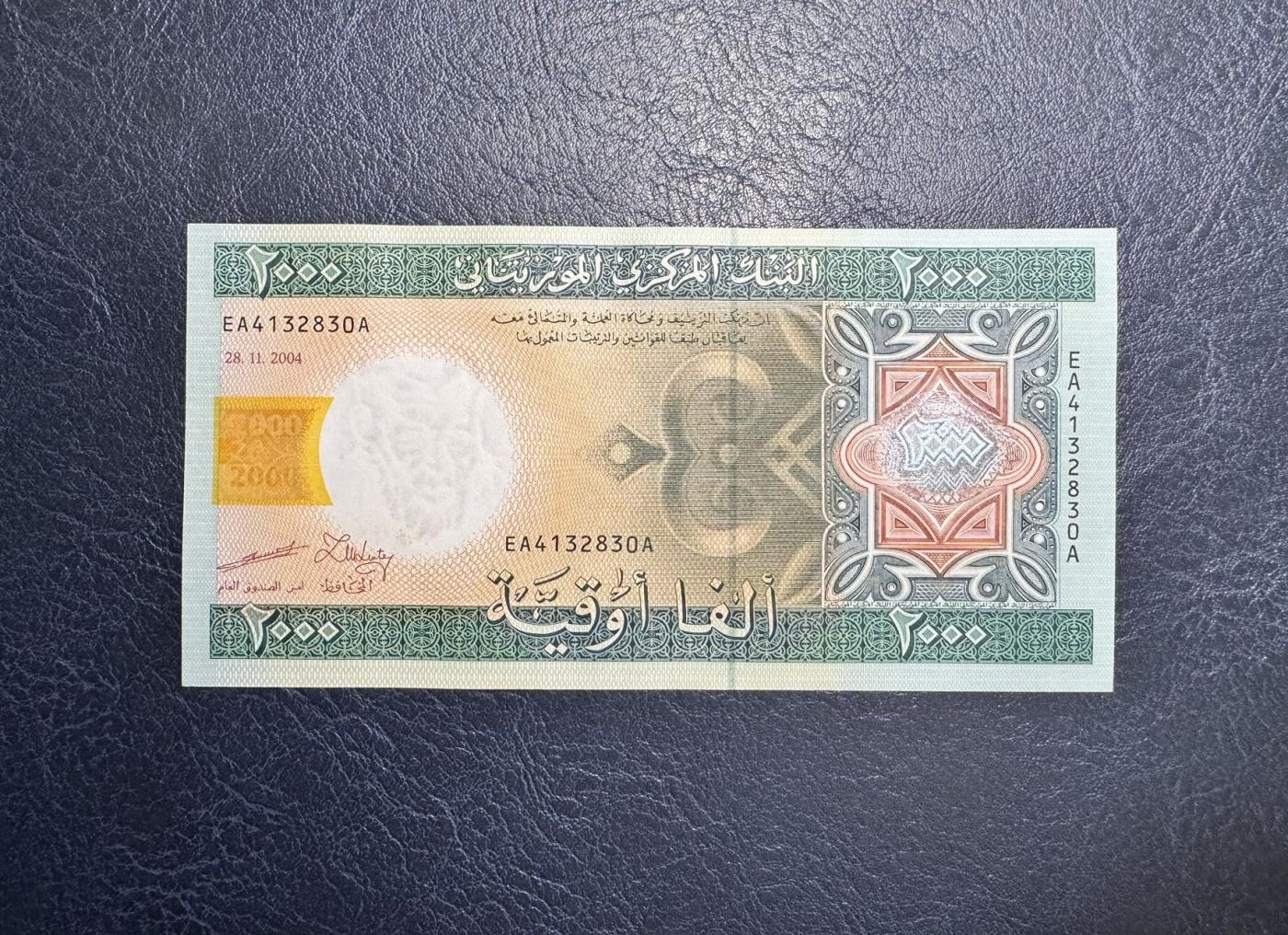 收藏联盟Quantum Auction 第344期拍卖  毛里塔尼亚2004年2000乌吉亚 品相全新UNC  首发冠 首版签名