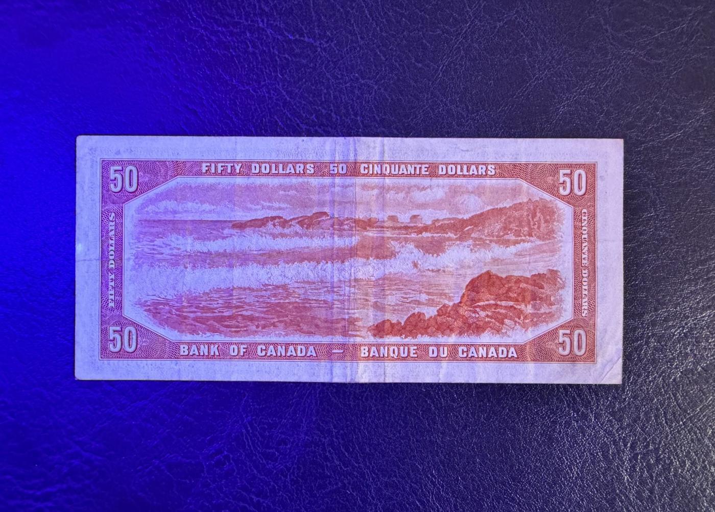 收藏联盟Quantum Auction 第344期拍卖  加拿大1954年50元 品相如图 号码无3457朦胧号