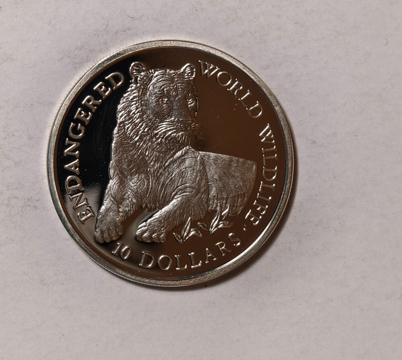 紫瑗钱币——第346期拍卖 库克群岛 1990年 世界濒危野生动物系列 非洲狮 10元 10克 0.925银 精制