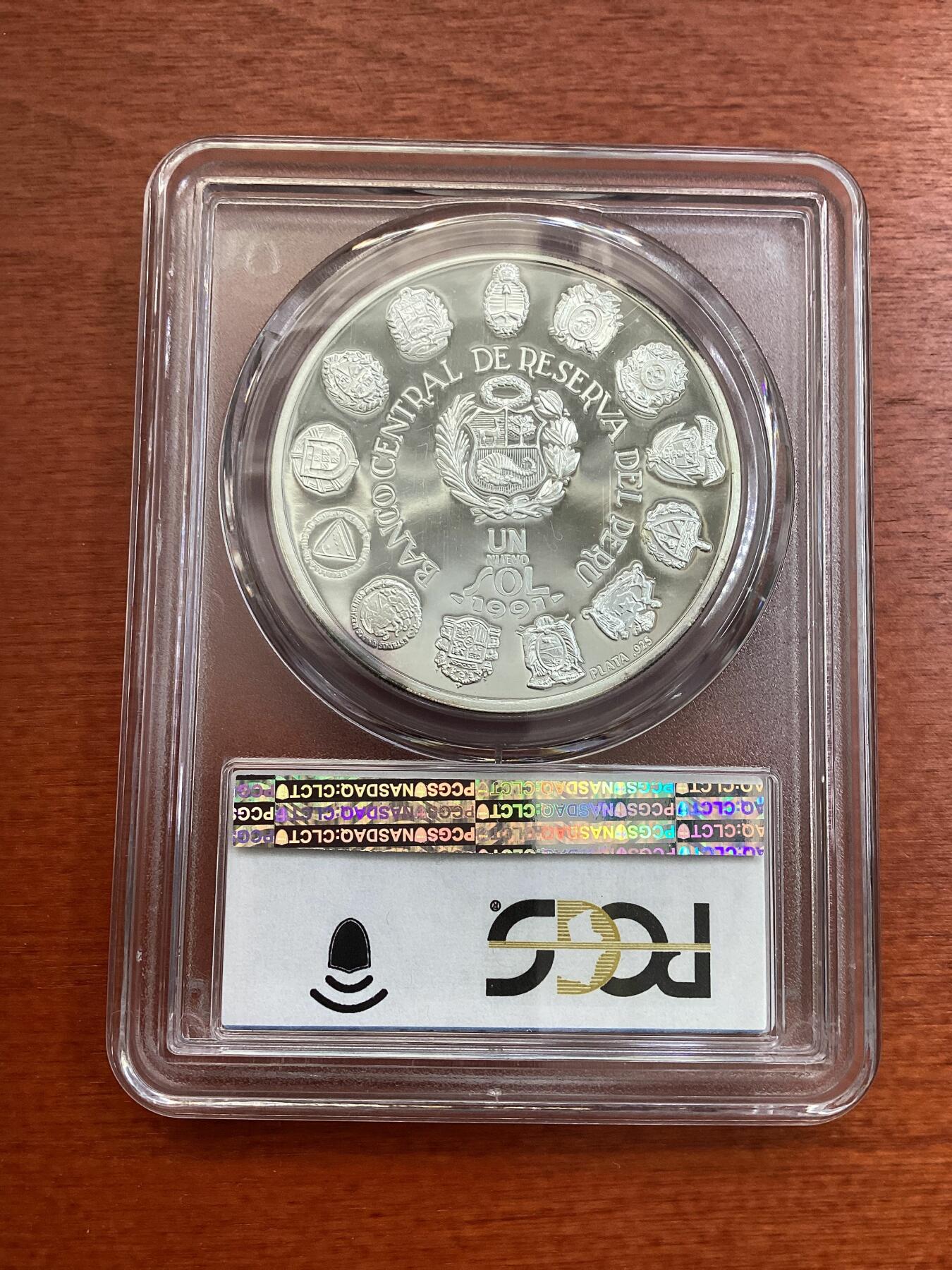 长老汇龙年精选第四场 1991 秘鲁发现美洲1索尔精制银币，PCGS PR69DCAM，七枚冠军分之一
