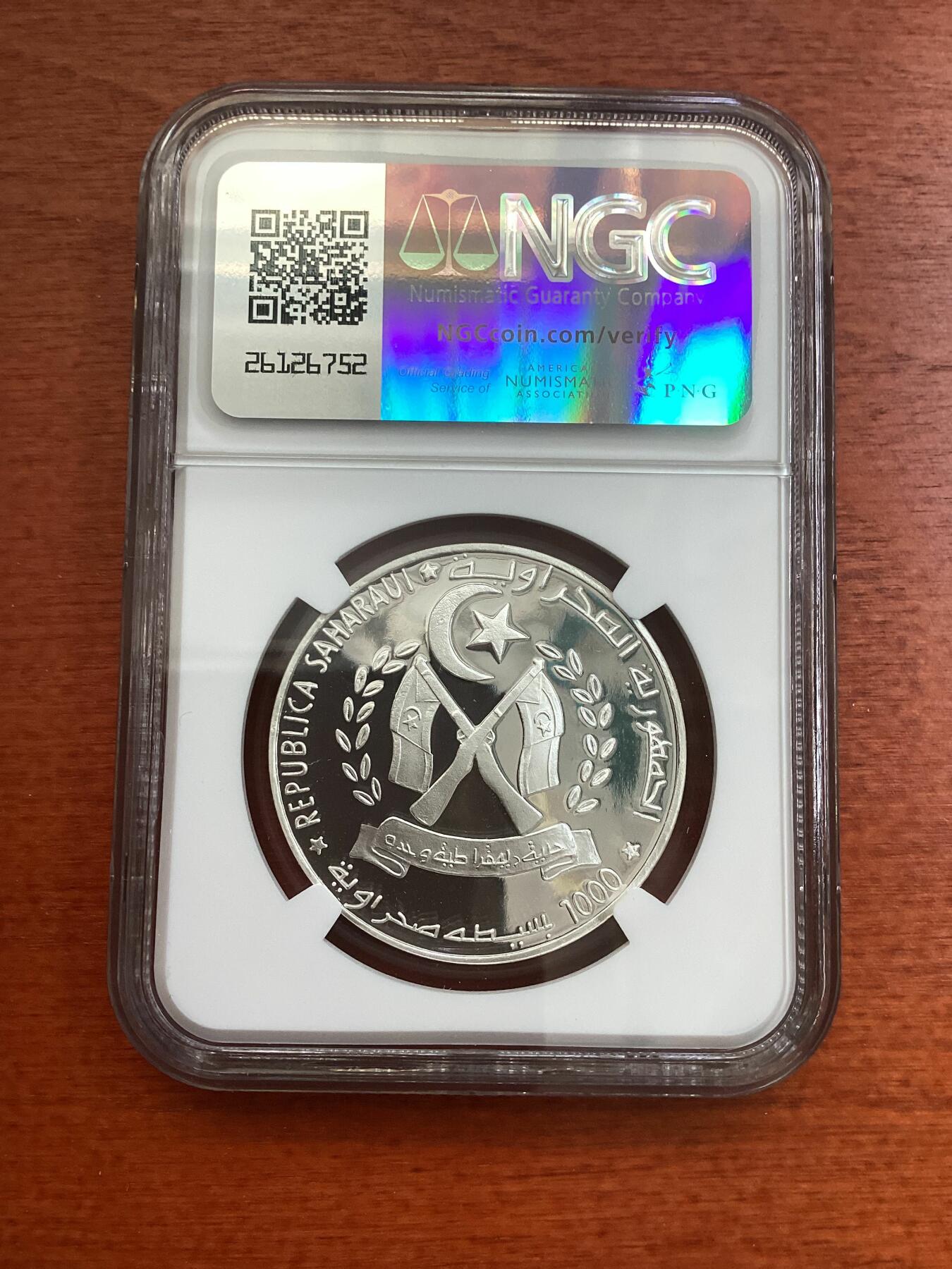 长老汇龙年精选第四场 1999 沙哈拉威达芬奇100比塞塔精制银币，NGC PF69UC，唯二冠军分
