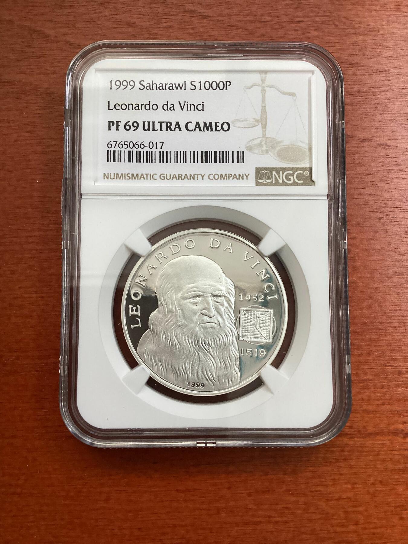 长老汇龙年精选第四场 1999 沙哈拉威达芬奇100比塞塔精制银币，NGC PF69UC，唯二冠军分
