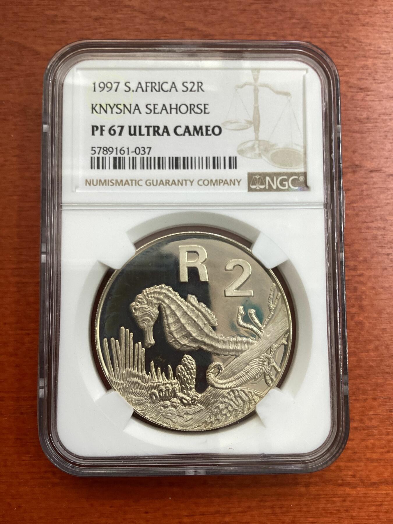 长老汇龙年精选第四场 1997 南非克尼斯纳海马2朗德精制银币，NGC PF67UC，发行量3000枚