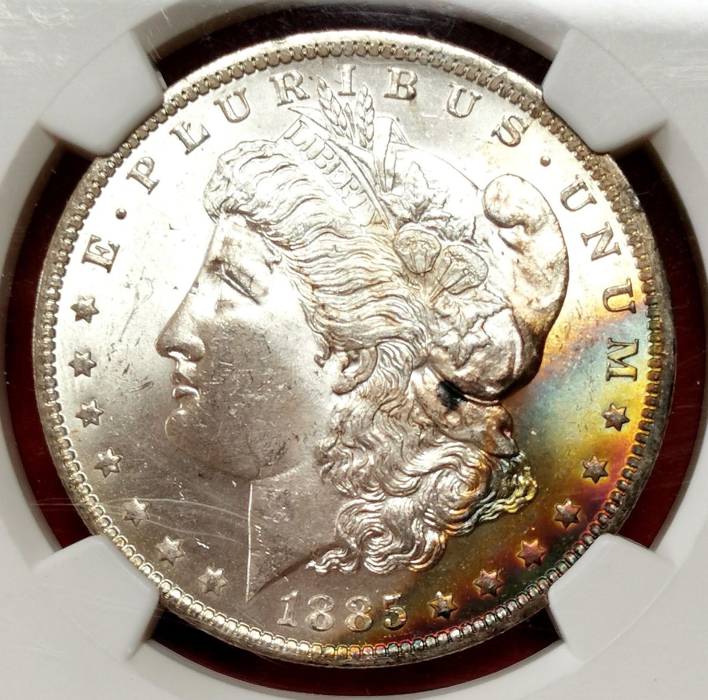 凡希社世界钱币微拍第二百六十八期 1885O美国摩根壹元NGC-MS65+，边缘一抹彩虹包浆！