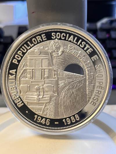 【海寕潮】拍卖第110期 - 【海寧潮】获奖币 阿尔巴尼亚1988年首条标准轨铁路建设42周年5盎司镂空精制银币原价3780元