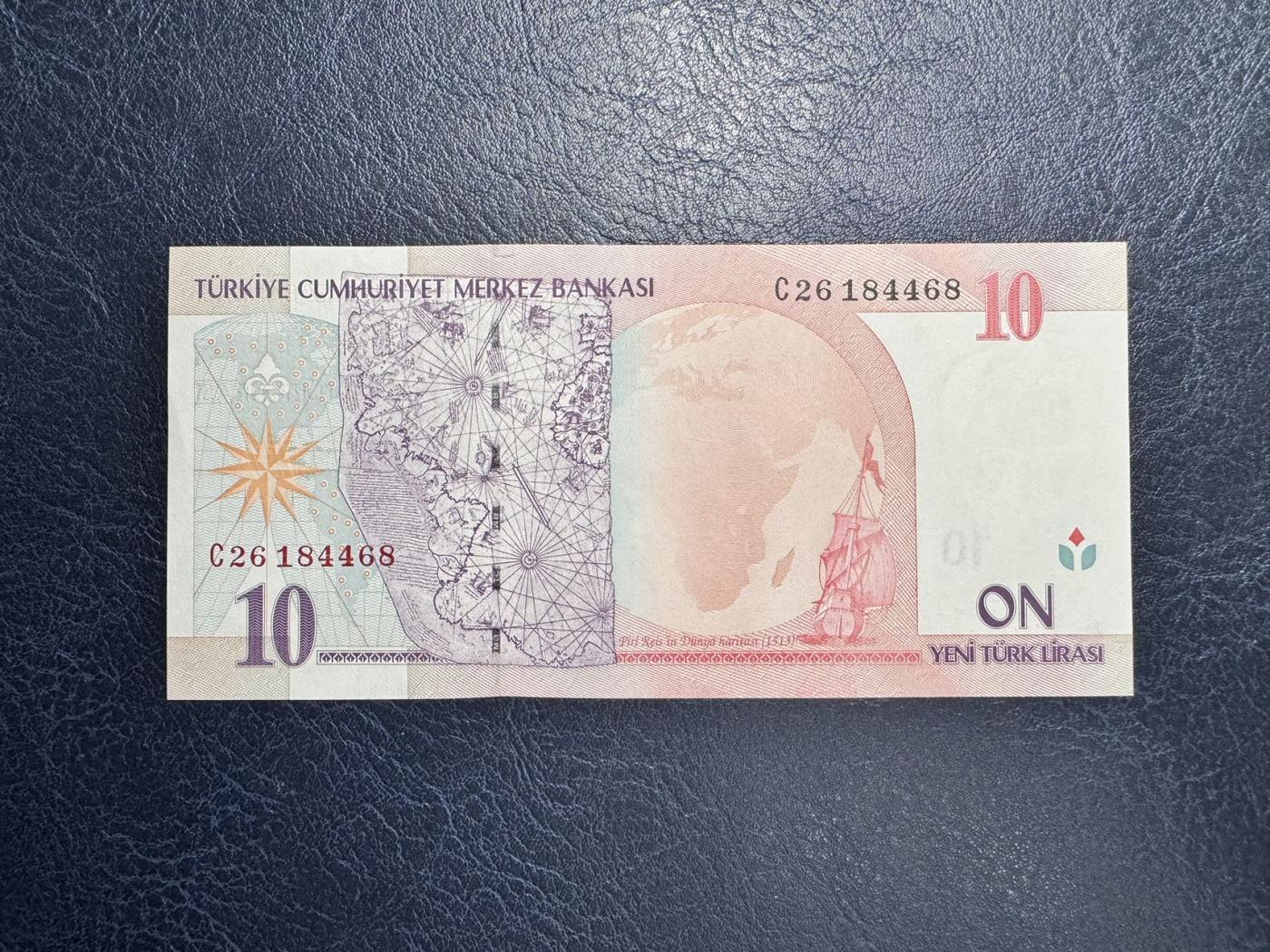 收藏联盟Quantum Auction 第346期拍卖  土耳其2008年10新里拉 品相UNC 边缘微瑕，细节如侧光  背面是皮瑞.雷斯地图(首次记录南冰洋存在)