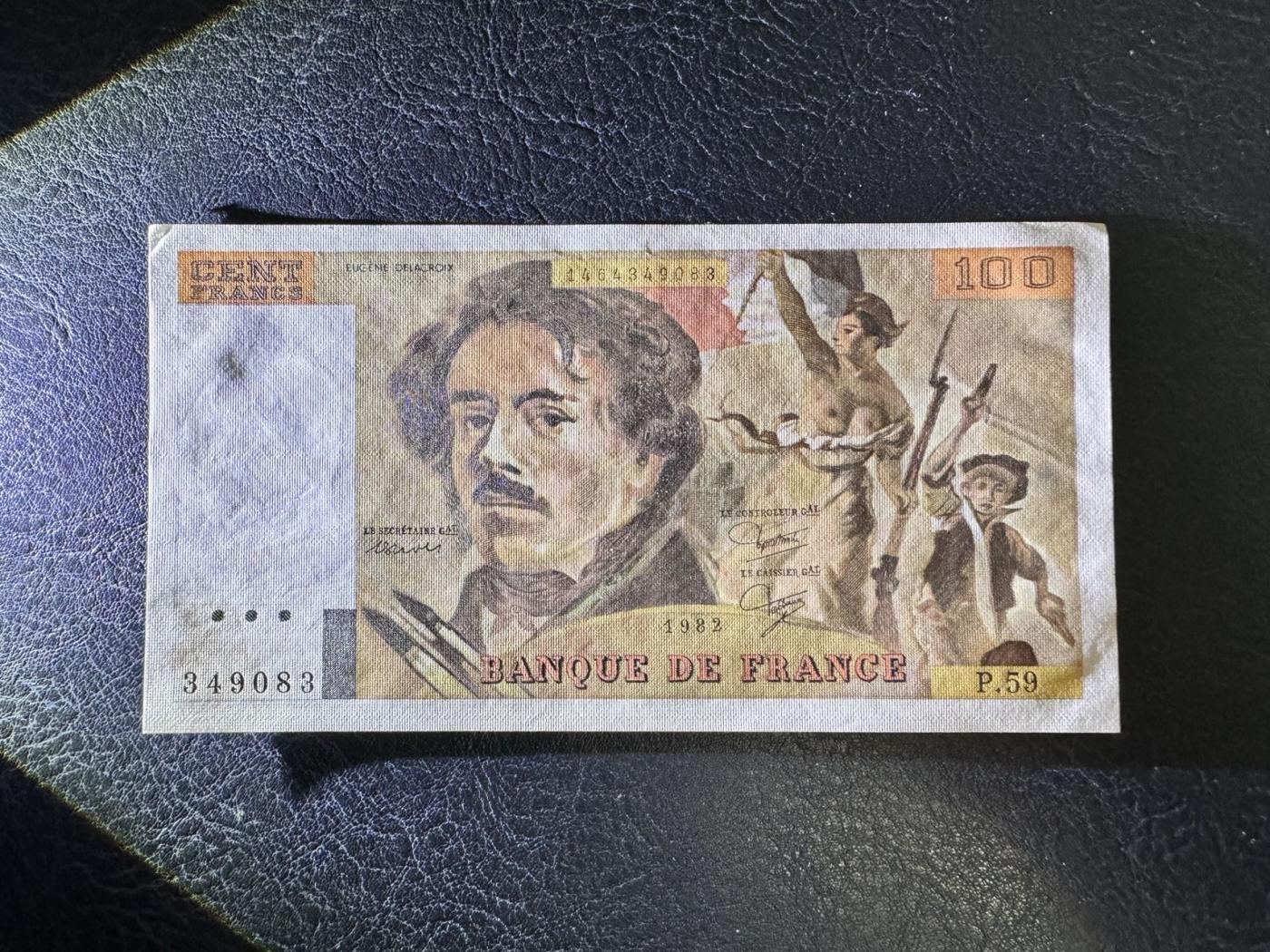 收藏联盟Quantum Auction 第346期拍卖  法国1982年100法郎 品相UNC-  票面边缘有轻微夹痕和角有瑕疵 自由引导人民 早期年份