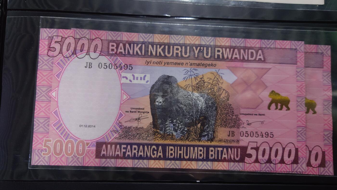 【世界钱币】精选微拍第106期暨2024年第17期  评级裸钞杂烩场 2014年卢旺达5000 全新绝品