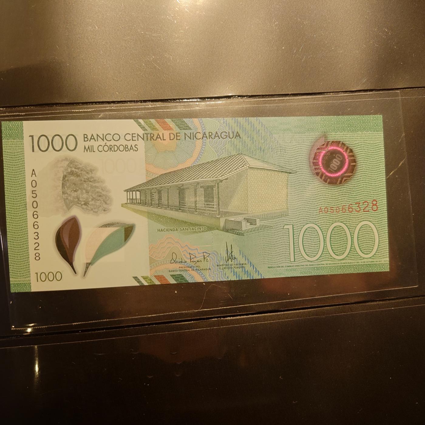 【世界钱币】精选微拍第106期暨2024年第17期  评级裸钞杂烩场 2017年尼加拉瓜1000 塑料钞 全新绝品A冠无47尾8