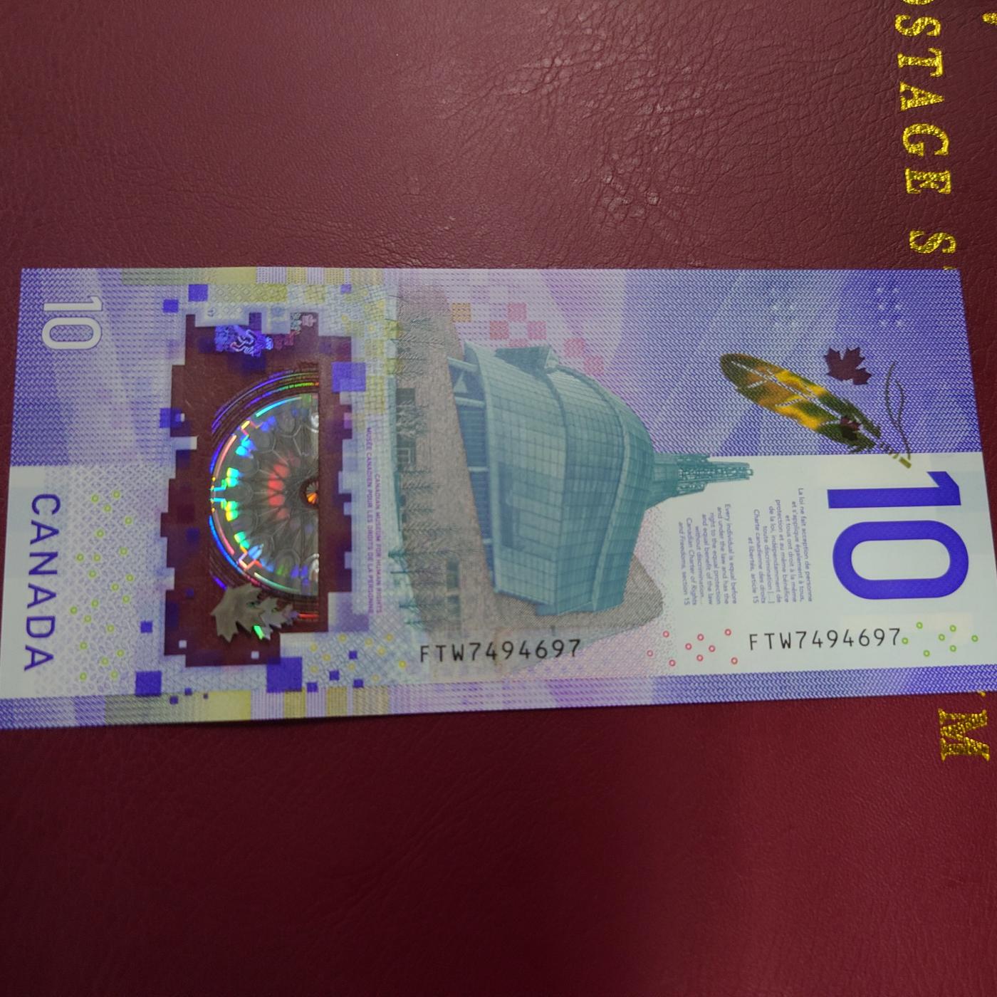 【世界钱币】精选微拍第106期暨2024年第17期  评级裸钞杂烩场 【已售出】2018年加拿大10元塑料钞 首发FTW冠 全新绝品尾号697