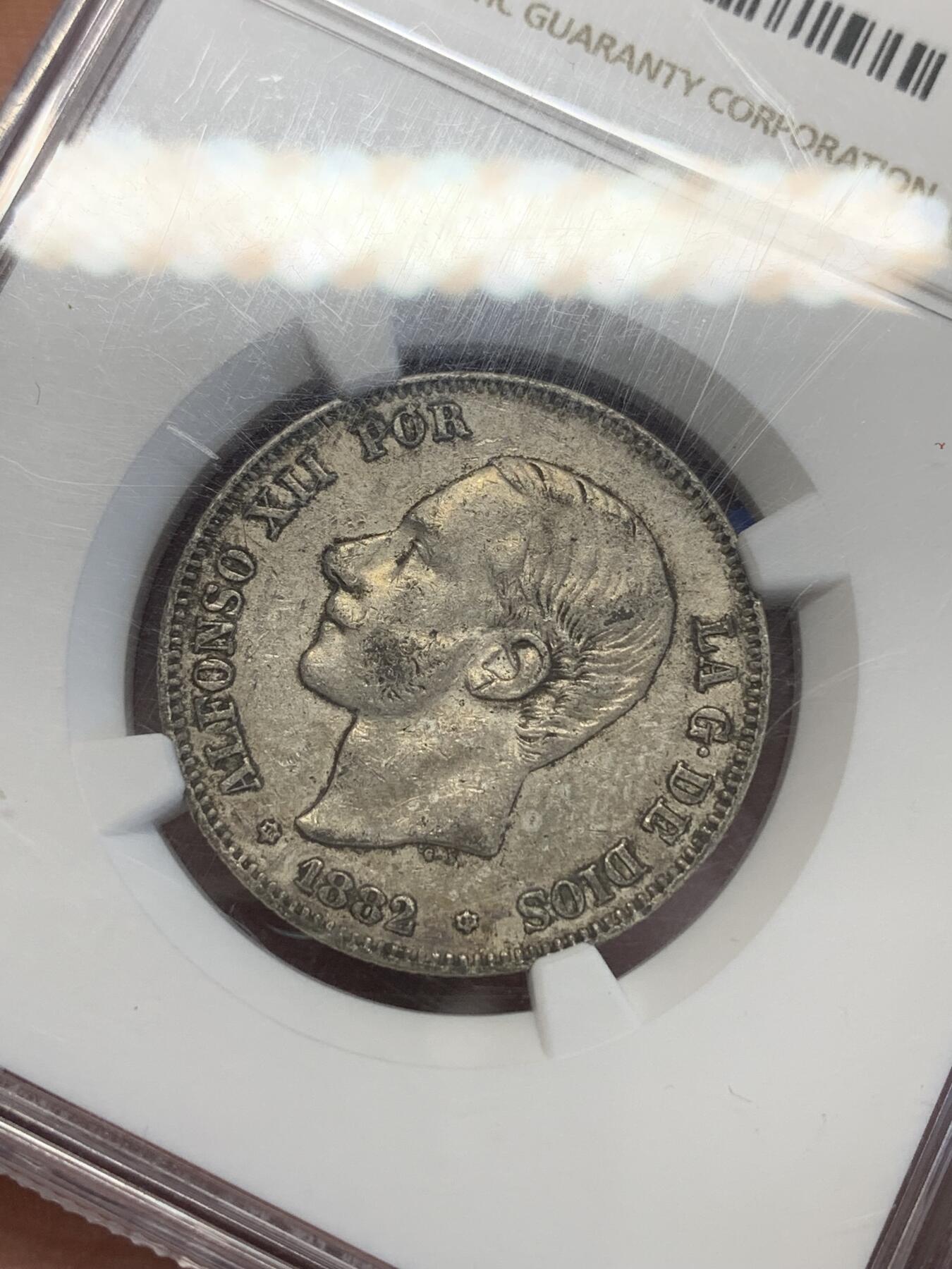 《竞宝斋》第269场- 周日，周一，周二  3场连拍 （全场包邮） NGC AU50 西班牙1882年2比塞塔小双柱银币 带包浆