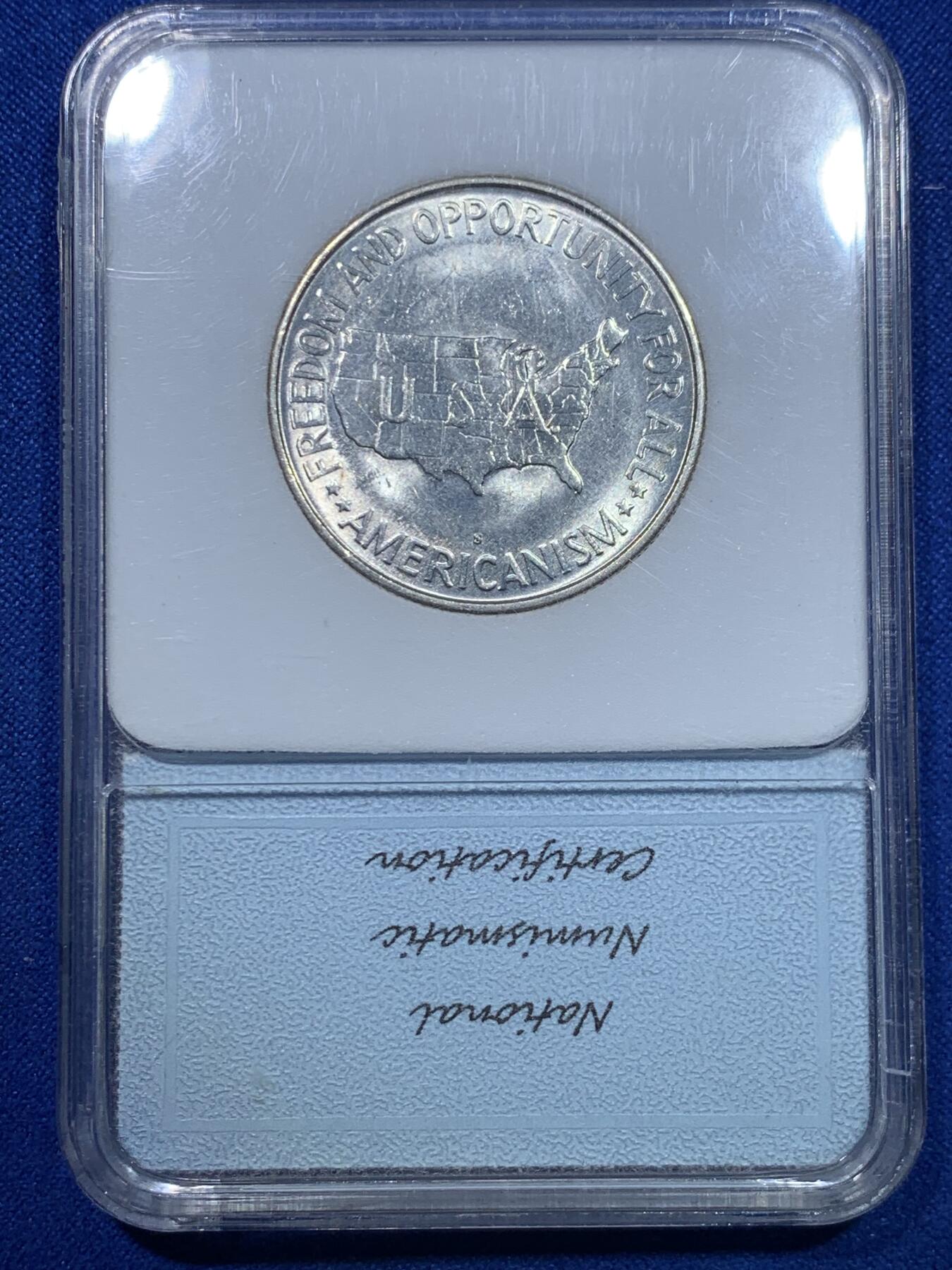 《竞宝斋》第269场- 周日，周一，周二  3场连拍 （全场包邮） NNC MS65 早期评级 美国地图半美元银币 盒子右侧边缘有裂纹