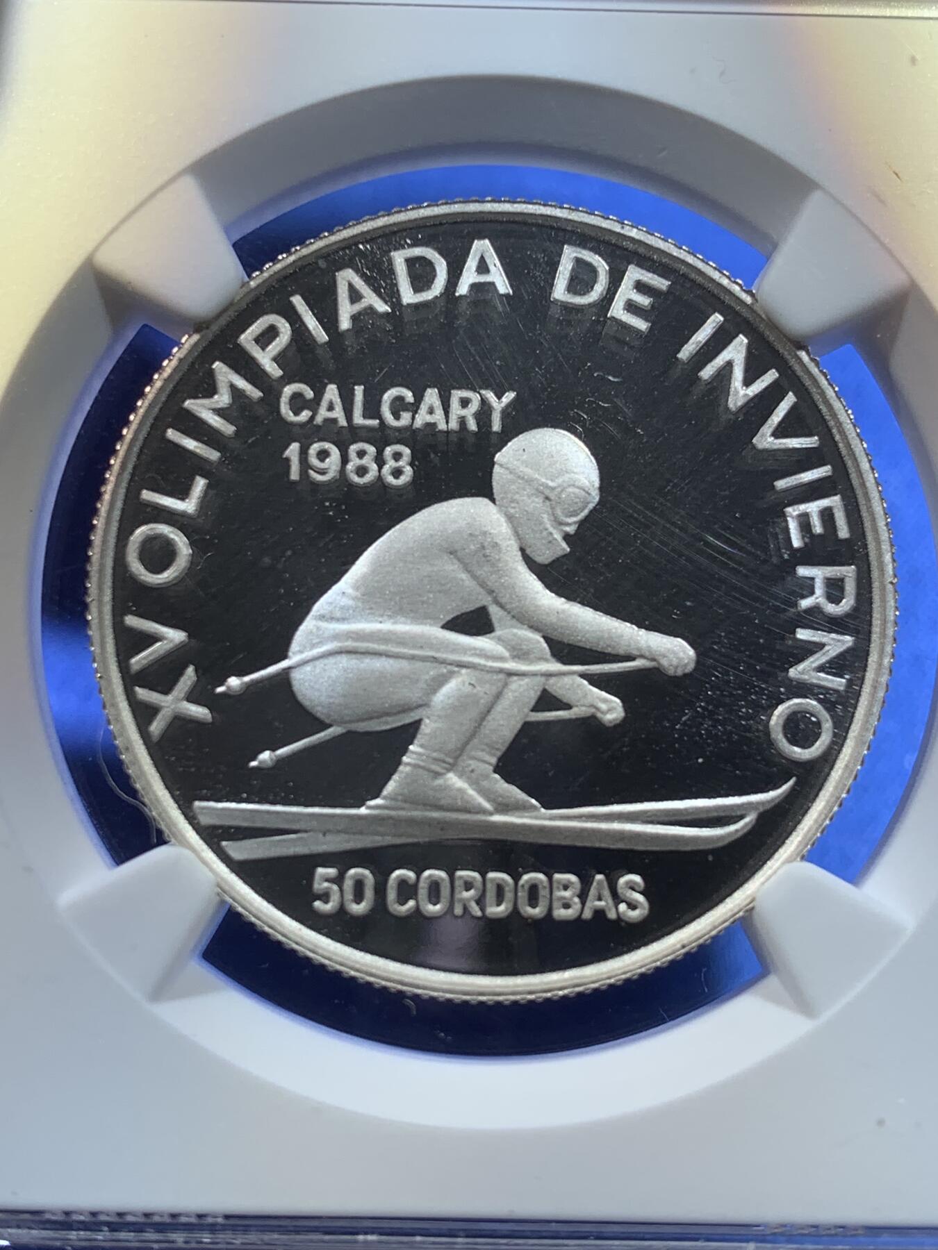 《竞宝斋》第269场- 周日，周一，周二  3场连拍 （全场包邮） NGC PF68UC 中美洲尼加拉瓜1988年卡尔加里奥运会滑雪50科多巴银币