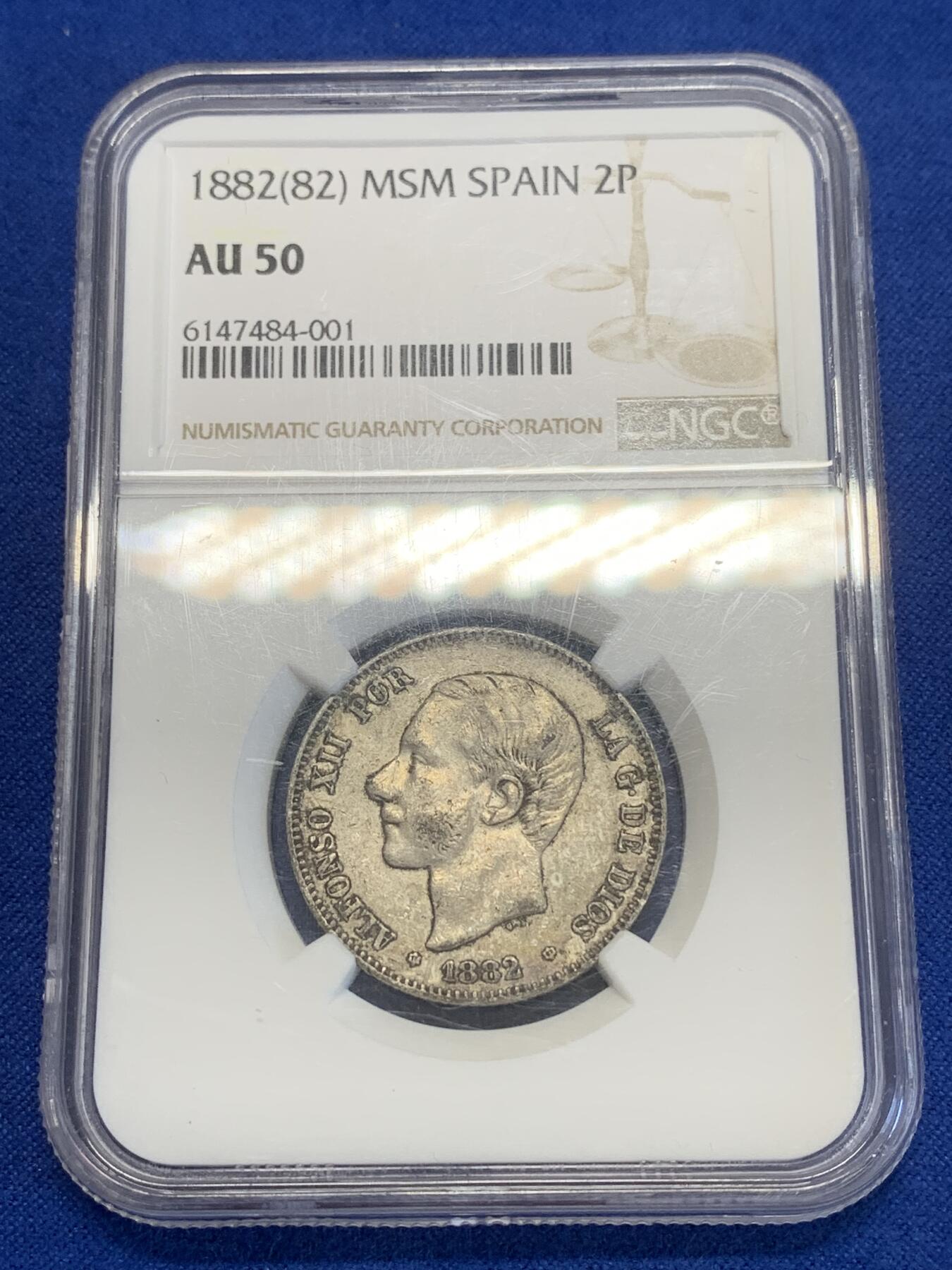 《竞宝斋》第269场- 周日，周一，周二  3场连拍 （全场包邮） NGC AU50 西班牙1882年2比塞塔小双柱银币 带包浆