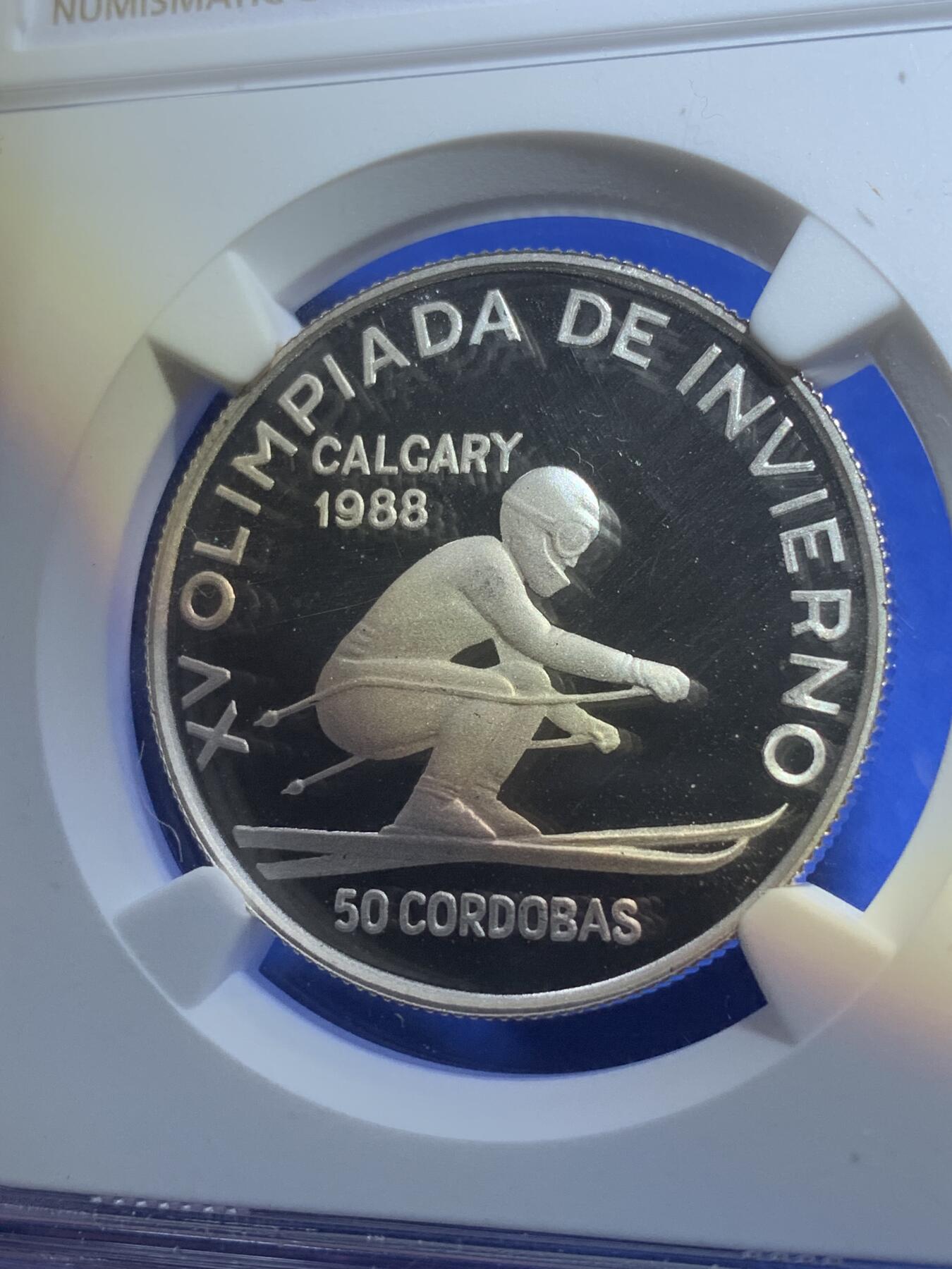 《竞宝斋》第269场- 周日，周一，周二  3场连拍 （全场包邮） NGC PF68UC 中美洲尼加拉瓜1988年卡尔加里奥运会滑雪50科多巴银币