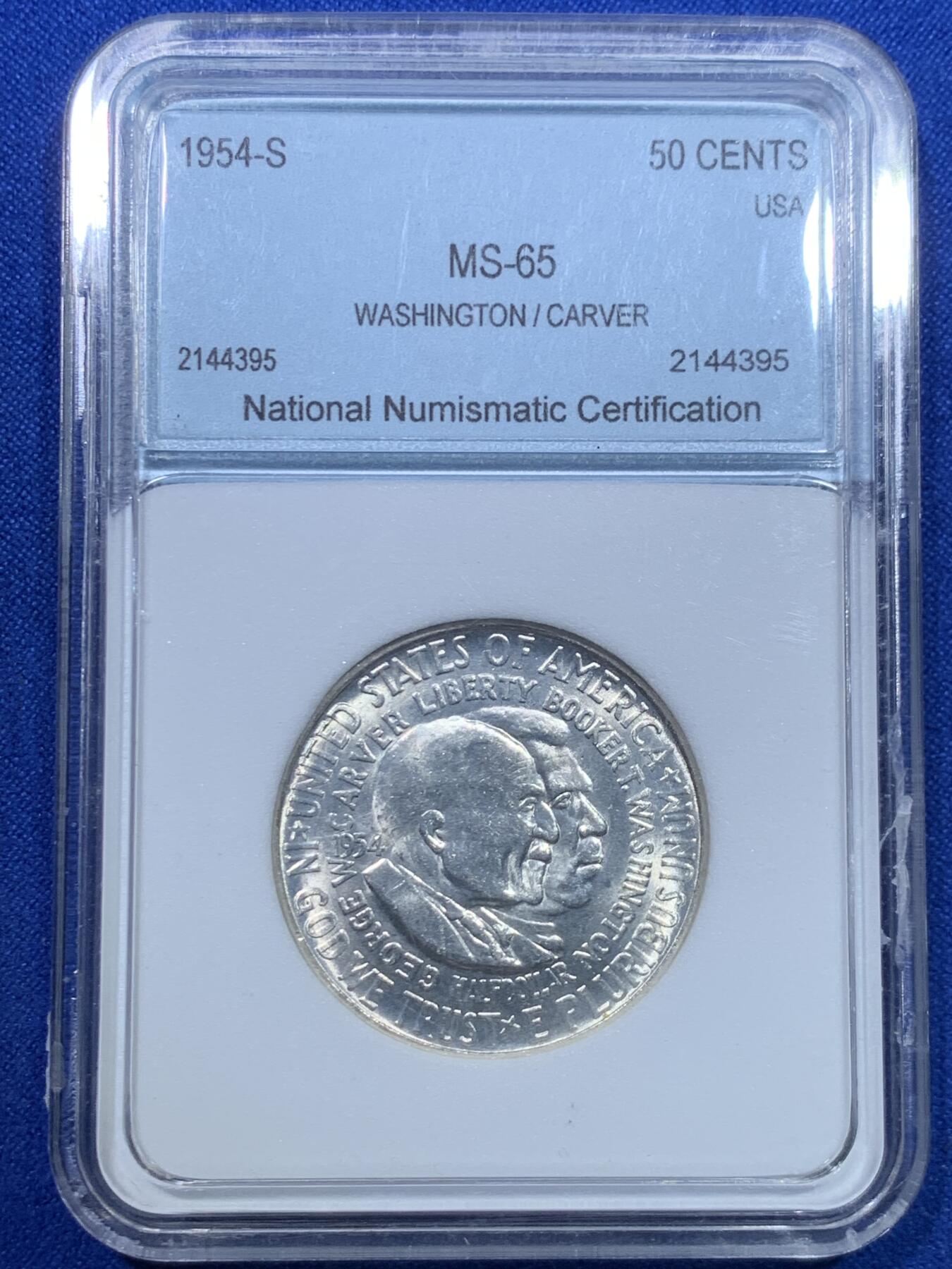 《竞宝斋》第269场- 周日，周一，周二  3场连拍 （全场包邮） NNC MS65 早期评级 美国地图半美元银币 盒子右侧边缘有裂纹