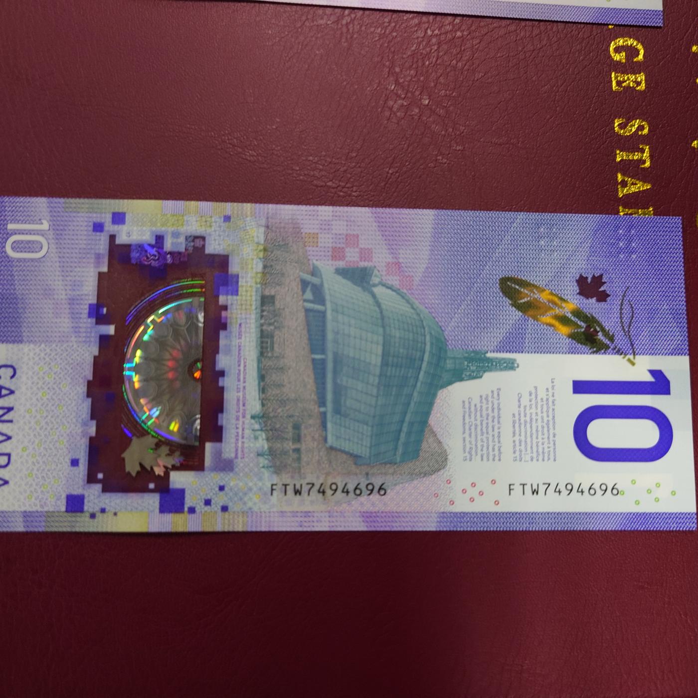 【世界钱币】精选微拍第106期暨2024年第17期  评级裸钞杂烩场 【已售出】2018年加拿大10元塑料钞 首发FTW冠 全新绝品尾号696