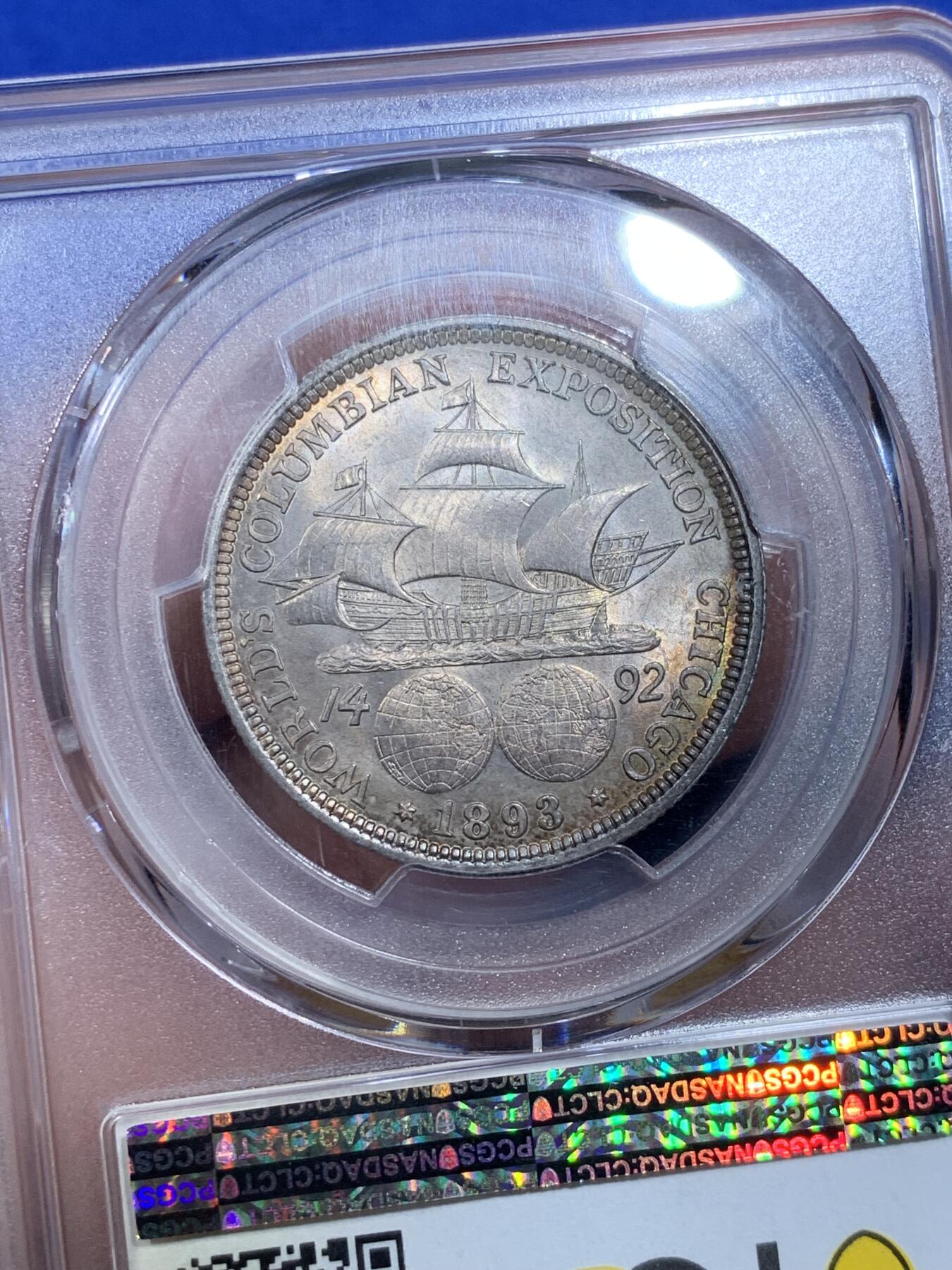 《竞宝斋》第269场- 周日，周一，周二  3场连拍 （全场包邮） PCGS MS63 美国1893年哥伦布帆船半圆银币 标签年份错误 淡金色环彩包浆 状态非常好