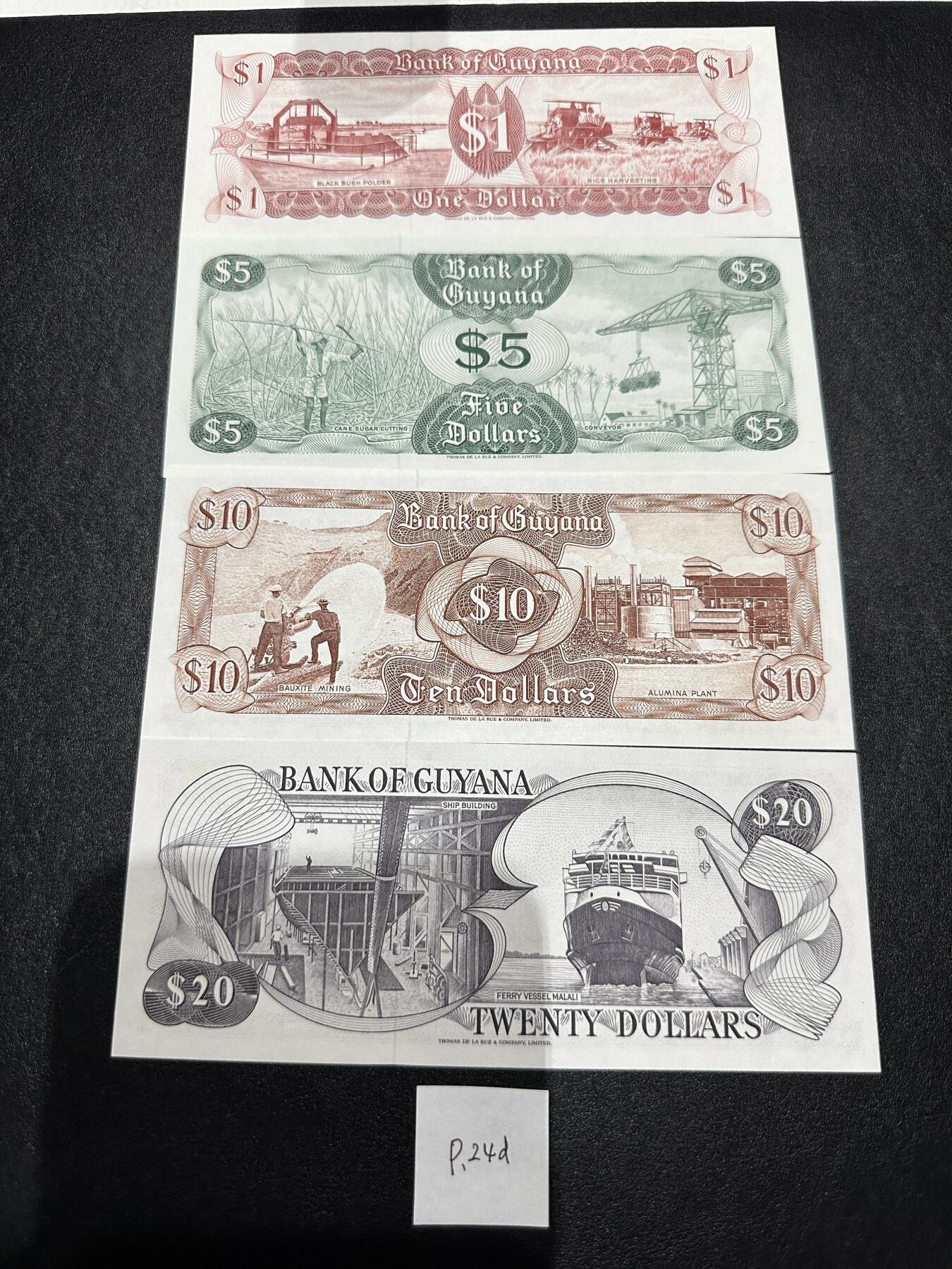 《外钞收藏家》第三百七十期（美洲纸币+其他） 圭亚那1966版，1/5/10/20元，4枚难得的全套	P21-24 全新20有极轻微潮点