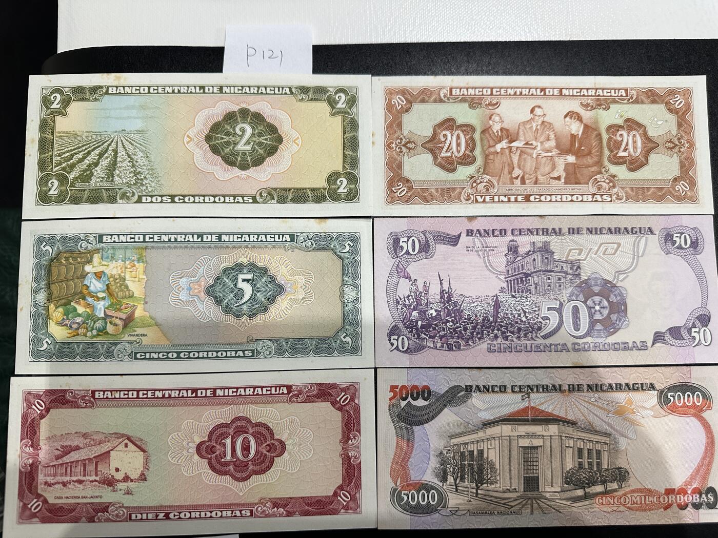 《外钞收藏家》第三百七十期（美洲纸币+其他） 尼加拉瓜早期套币2/5/10/20/50/5000，6枚	P121-146 全新 轻微潮