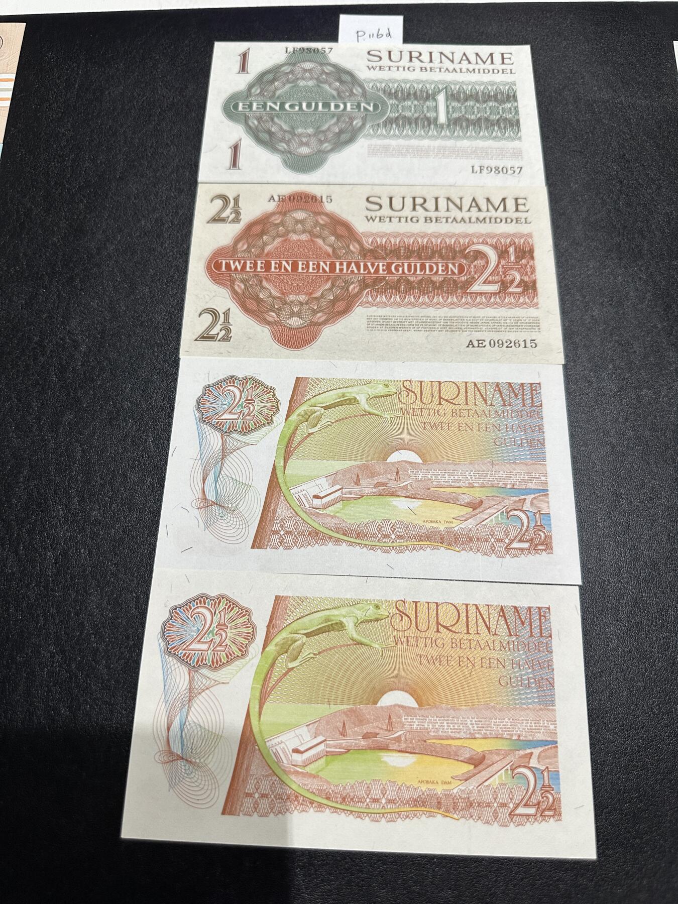 《外钞收藏家》第三百七十期（美洲纸币+其他） 苏里南早期套币，1/2.5/2.5/2.5盾，4枚难得的全套	P116-119 全新 荧光几乎没问题