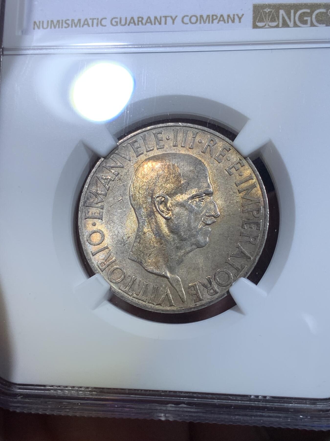 《竞宝斋》第269场- 周日，周一，周二  3场连拍 （全场包邮） NGC MS62 意大利1936年10里拉银币 法西斯时期发行 整体淡金彩 背面经典拿着束棒的亚平宁女神屹立船头形象