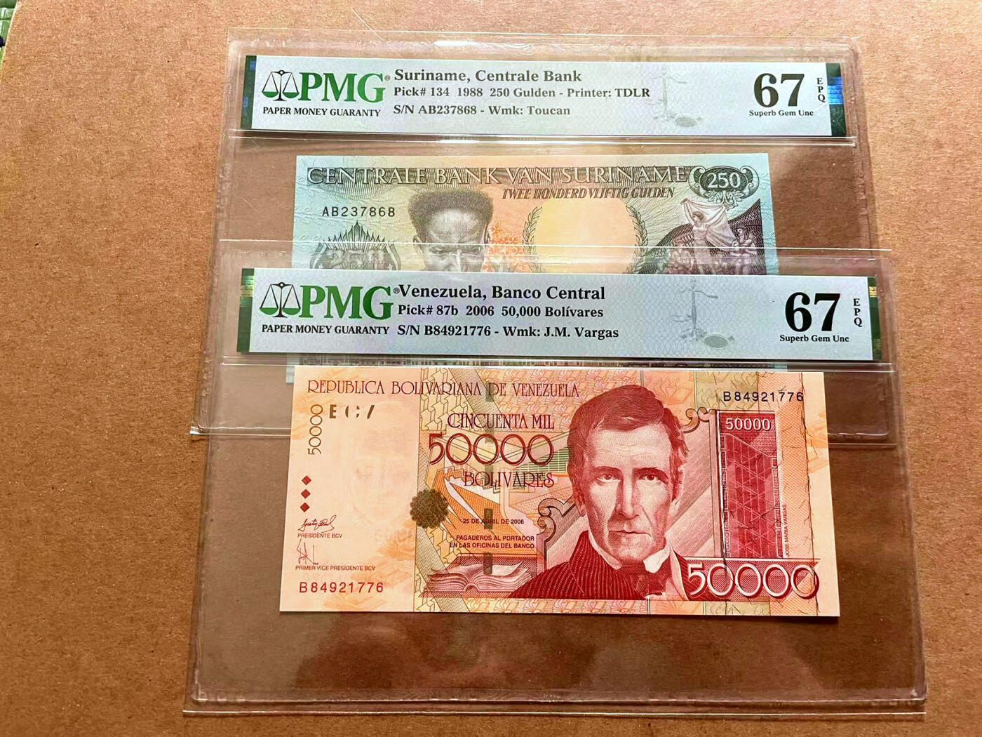【Blue Auction】✨世界纸币精拍第479期【精】 【一组2张】苏里南 1988年250盾&委内瑞拉 2006年50000玻利维亚诺 PMG67EPQ 高分