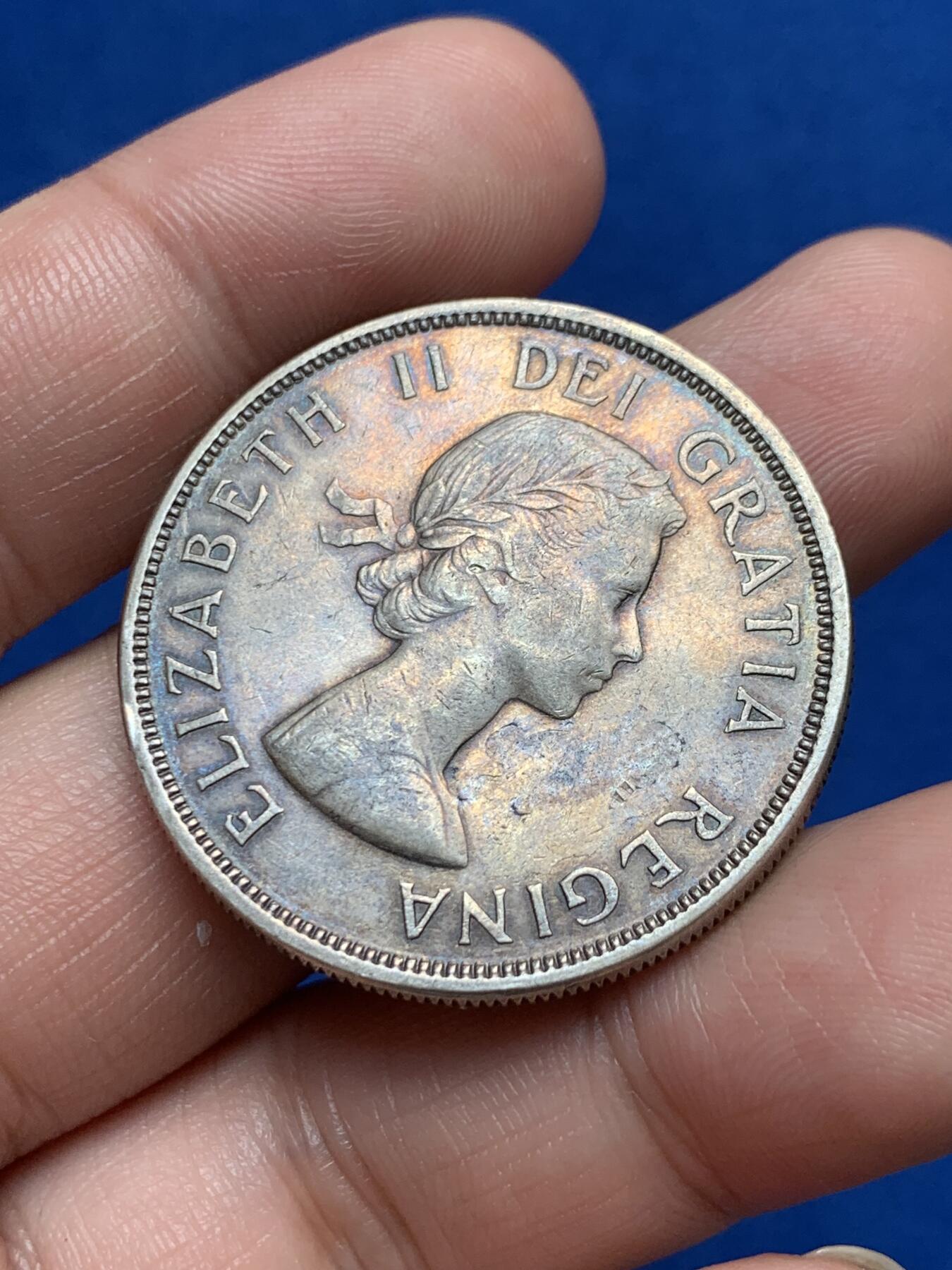 《竞宝斋》第270场- 周日，周一，周二  3场连拍 （全场包邮） 加拿大1961年划船1元银币 原味五彩枪灰包浆味道十足