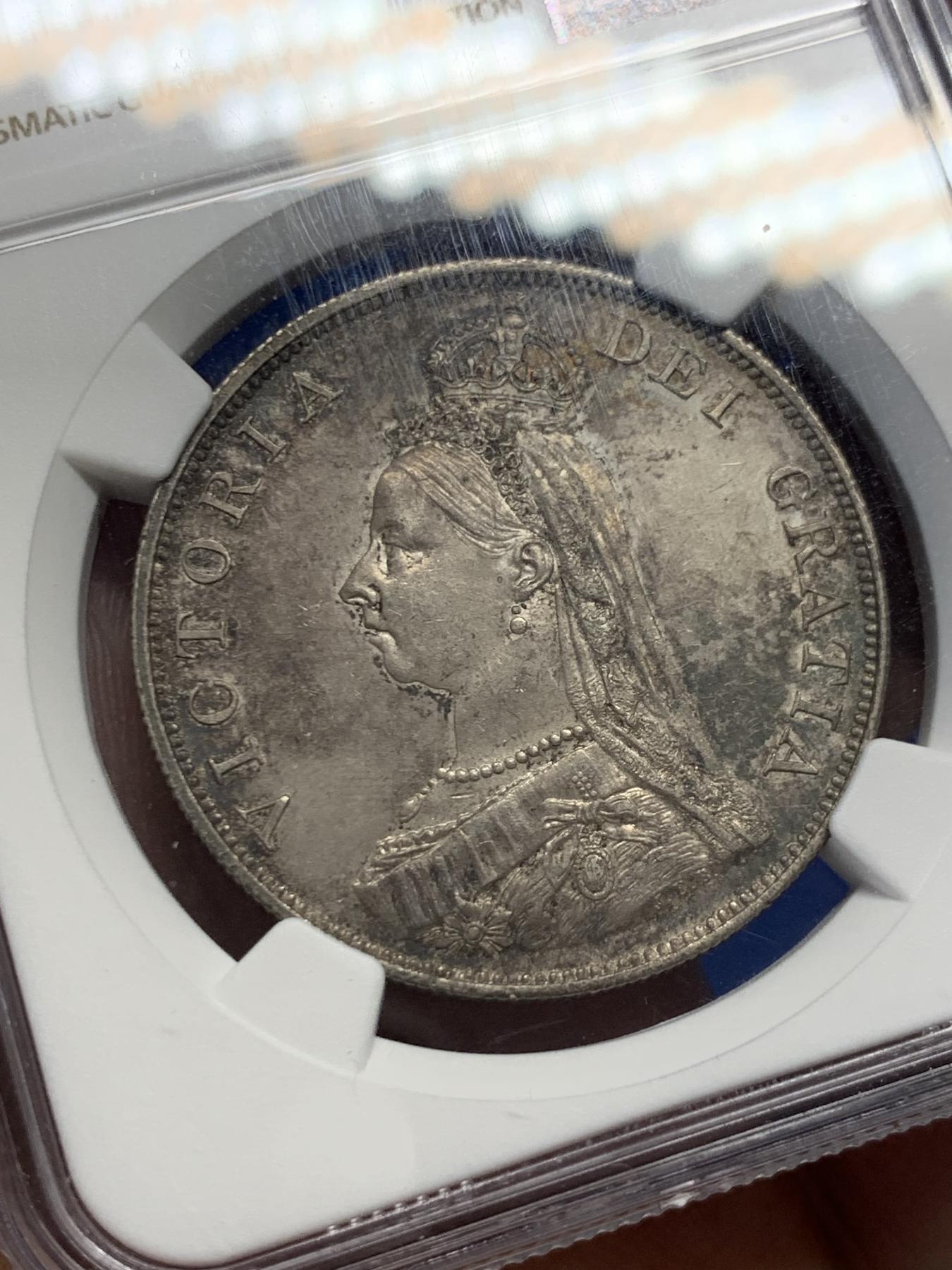 《竞宝斋》第270场- 周日，周一，周二  3场连拍 （全场包邮） NGC MS62 英国1887年维多利亚高冠双弗洛林银币 深彩包浆 底板不错