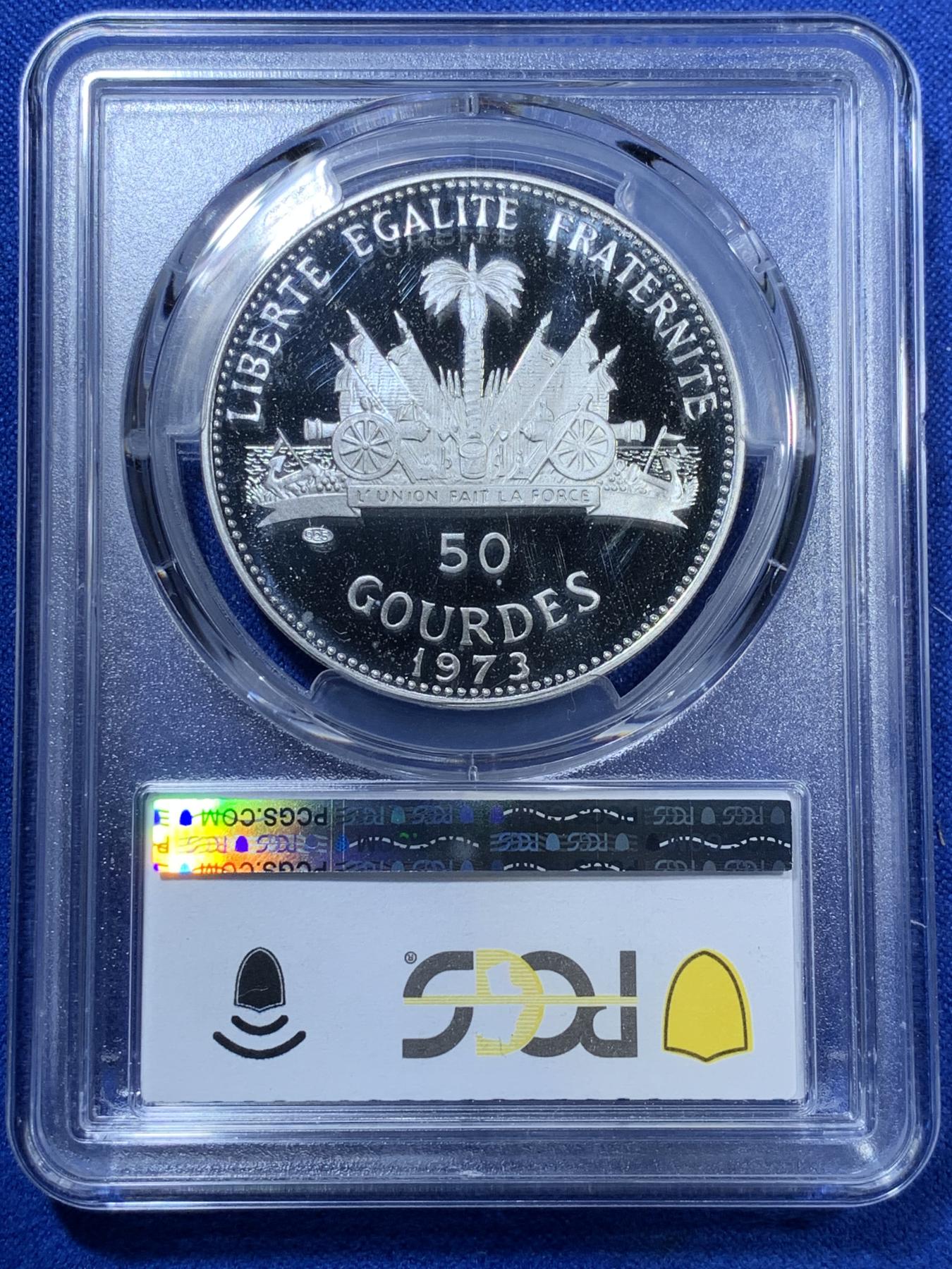 《竞宝斋》第270场- 周日，周一，周二  3场连拍 （全场包邮） PCGS金盾 PR69DCAM 海地1973年吹海螺的小妹妹50古德精制银币