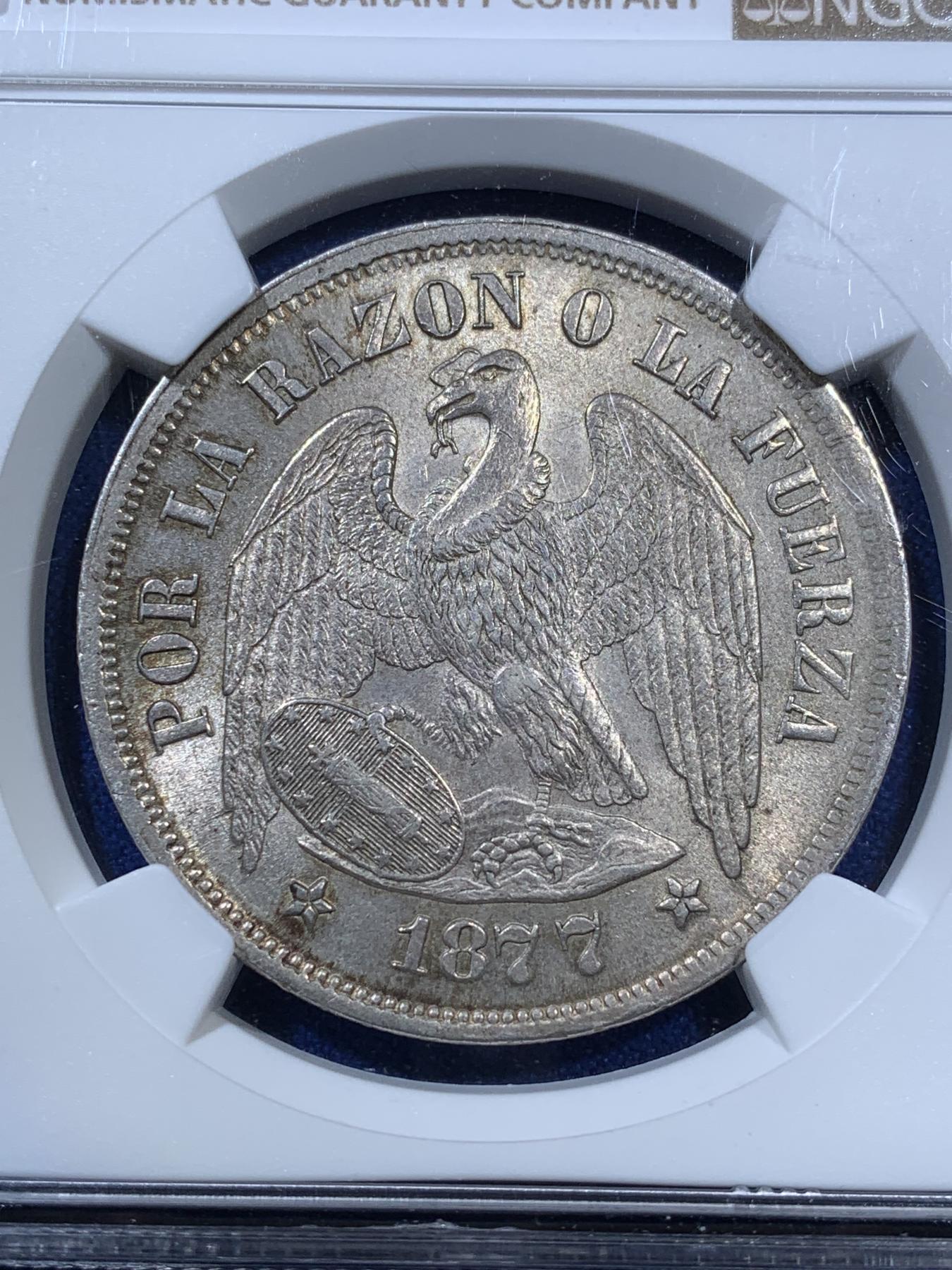 《竞宝斋》第270场- 周日，周一，周二  3场连拍 （全场包邮） NGC MS63 1877年智利秃鹰 1比索 原味包浆细节极好 为1879年硝石战争开始前两年版，比较少见 意义非凡
