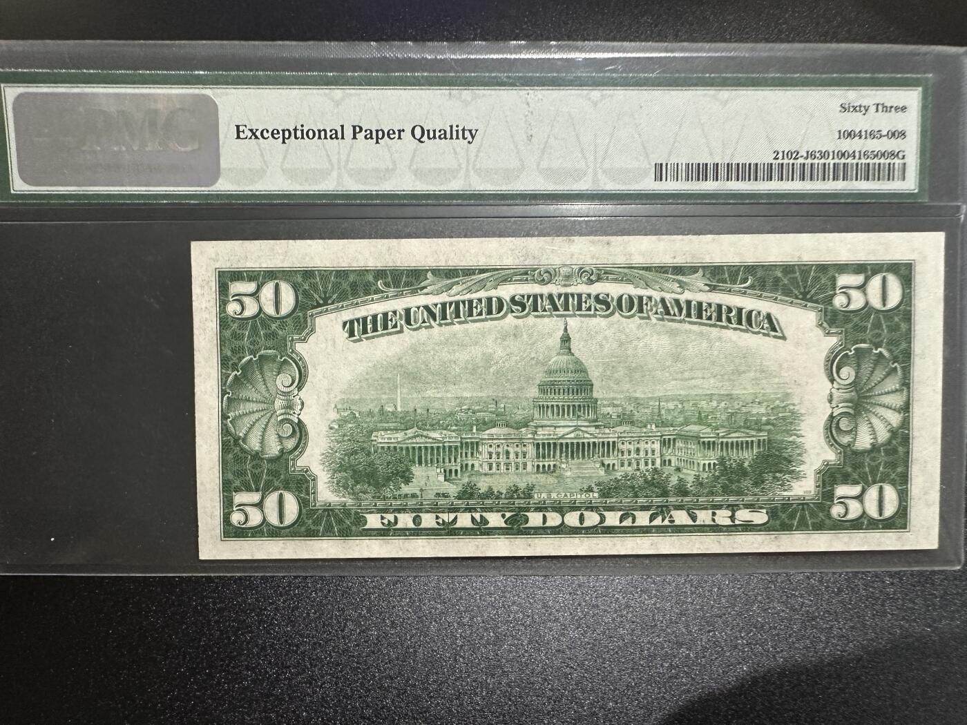 《外钞收藏家》第三百七十期（美洲纸币+其他） 美国1934年50美元，罕见J区堪萨斯城，第一代壳严格评级PMG63EPQ，老壳更具收藏价值，目录价为275美元