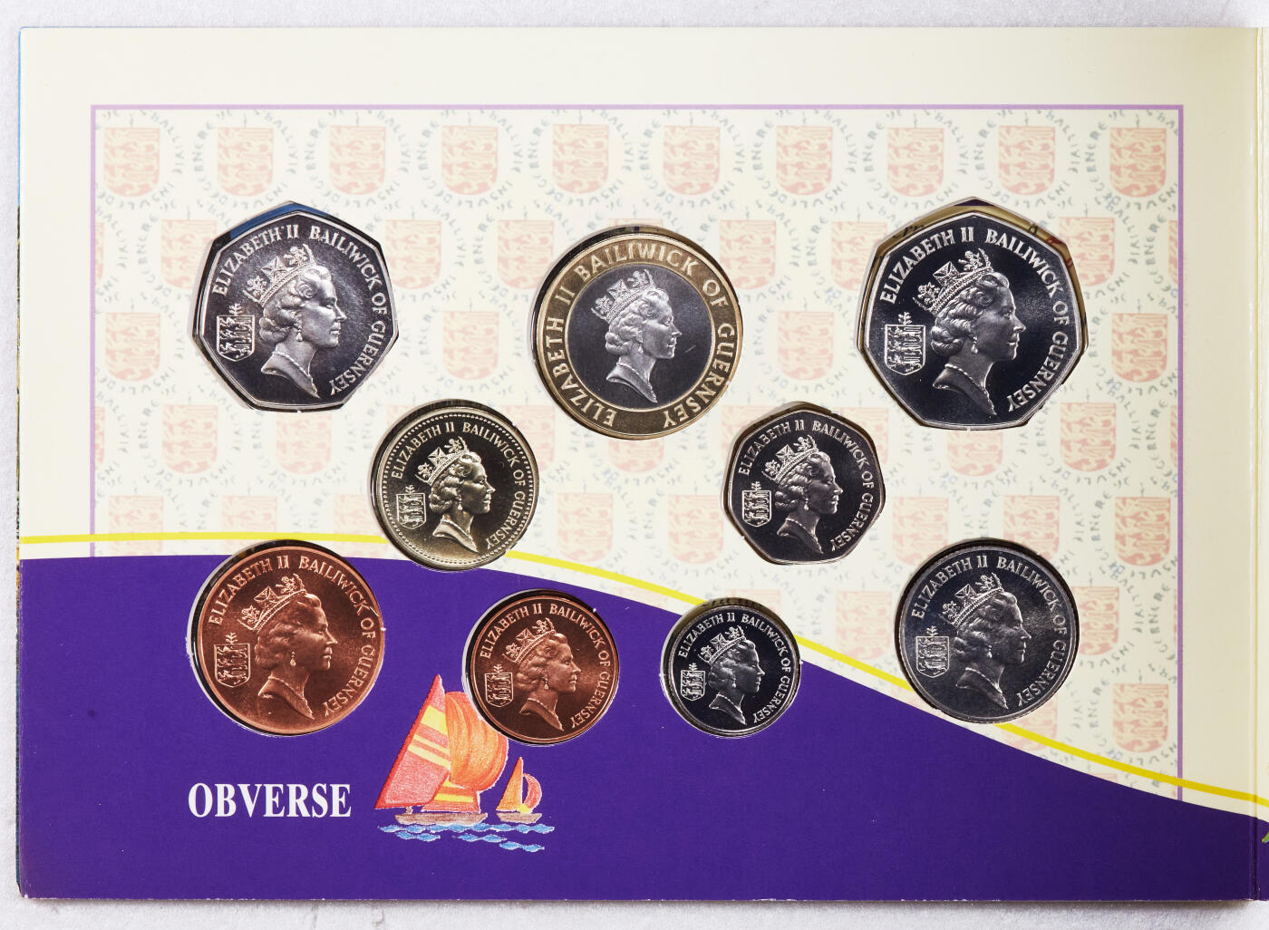 S&S Numismatic世界钱币-拍卖 第115期  英属格恩西岛1997年 女皇高冠版 9枚套币官方卡币  只发行1年，非常稀少