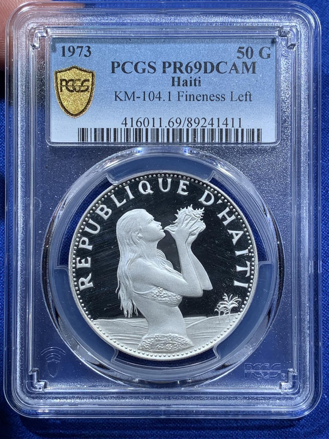 《竞宝斋》第270场- 周日，周一，周二  3场连拍 （全场包邮） PCGS金盾 PR69DCAM 海地1973年吹海螺的小妹妹50古德精制银币