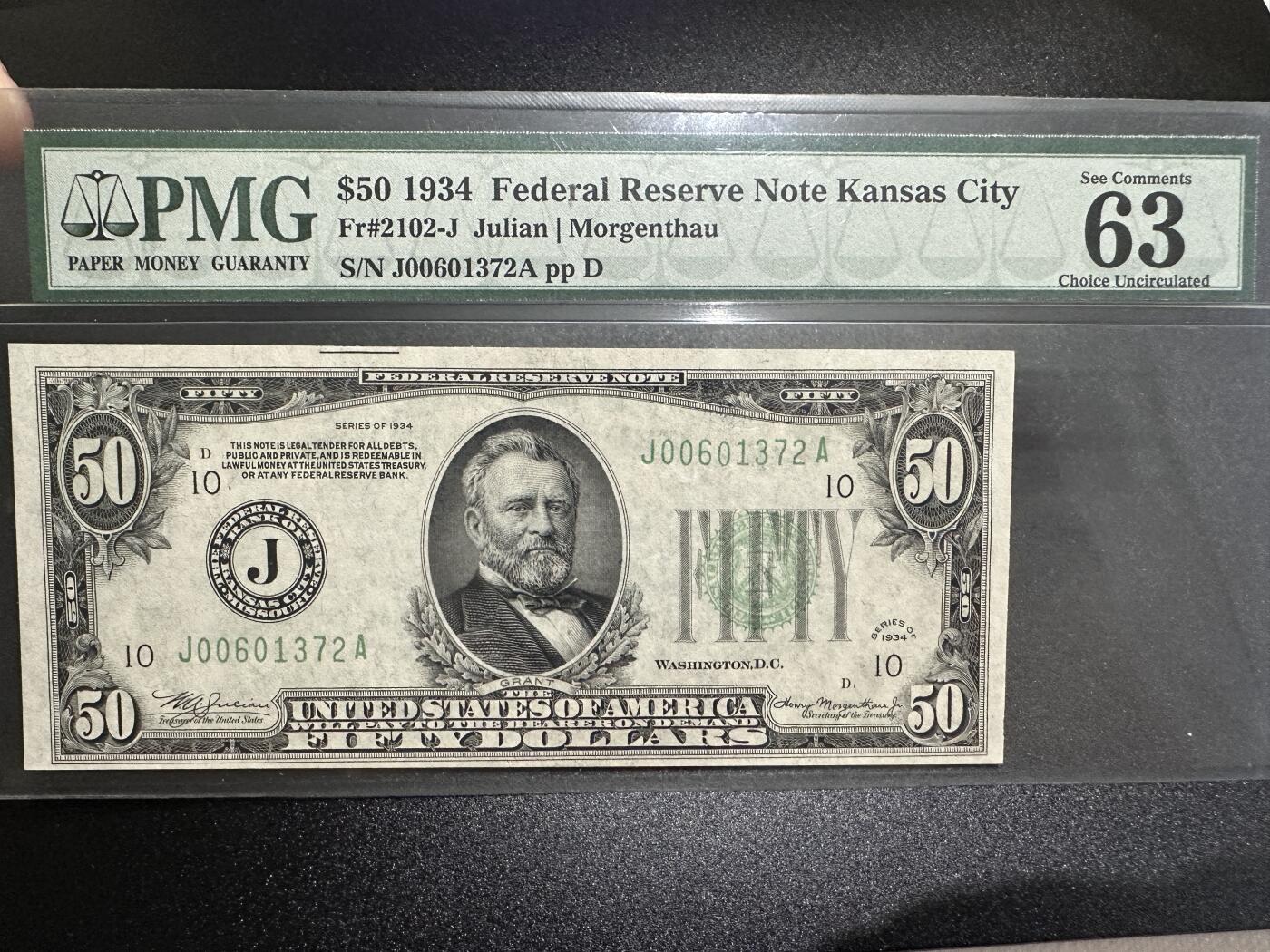 《外钞收藏家》第三百七十期（美洲纸币+其他） 美国1934年50美元，罕见J区堪萨斯城，第一代壳严格评级PMG63EPQ，老壳更具收藏价值，目录价为275美元