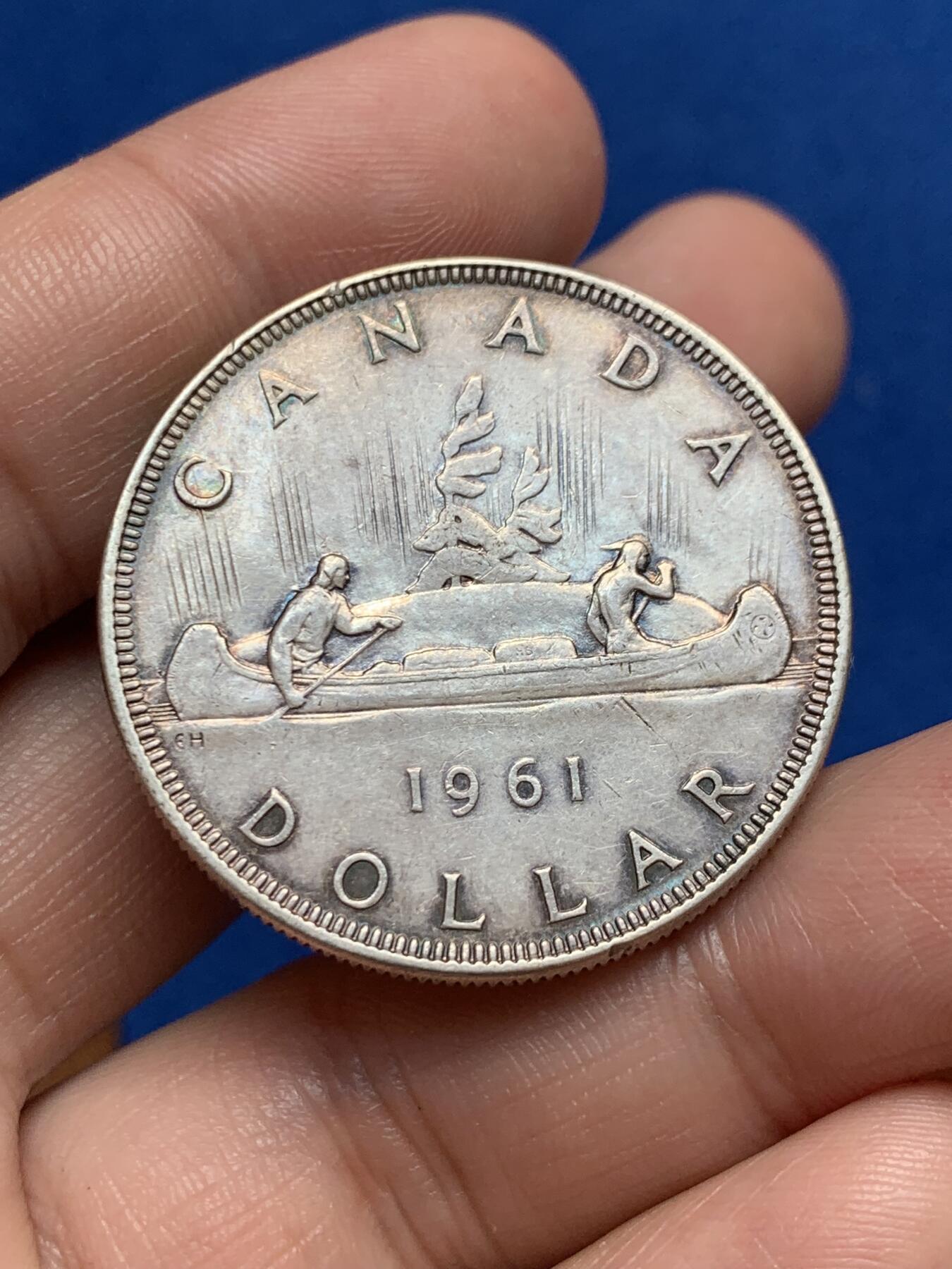 《竞宝斋》第270场- 周日，周一，周二  3场连拍 （全场包邮） 加拿大1961年划船1元银币 原味五彩枪灰包浆味道十足