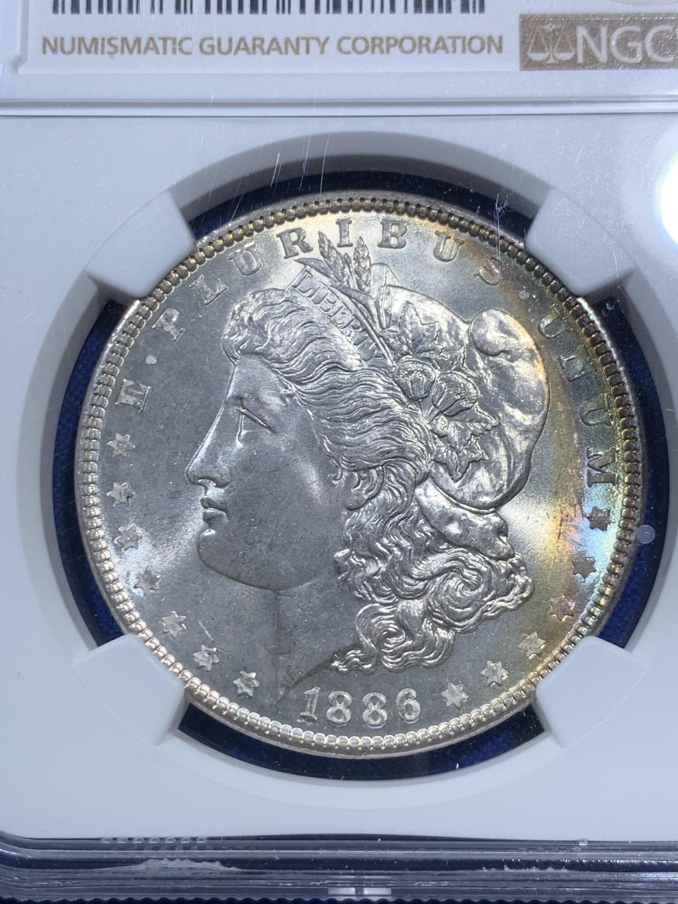 《竞宝斋》第270场- 周日，周一，周二  3场连拍 （全场包邮） NGC MS64 美国1886年摩根大银币 极美彩虹 月牙五彩 车轮转光 底板丝滑 胜过大多64的品质 好彩好状态