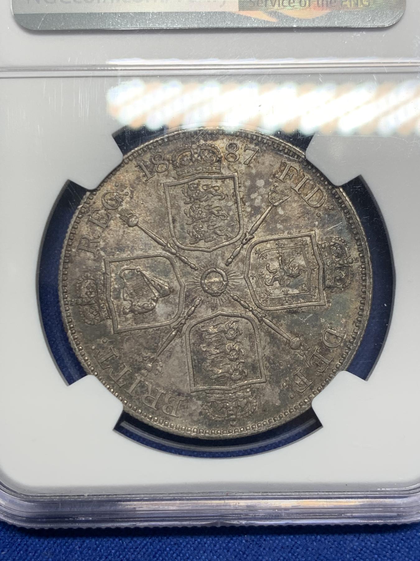 《竞宝斋》第270场- 周日，周一，周二  3场连拍 （全场包邮） NGC MS62 英国1887年维多利亚高冠双弗洛林银币 深彩包浆 底板不错