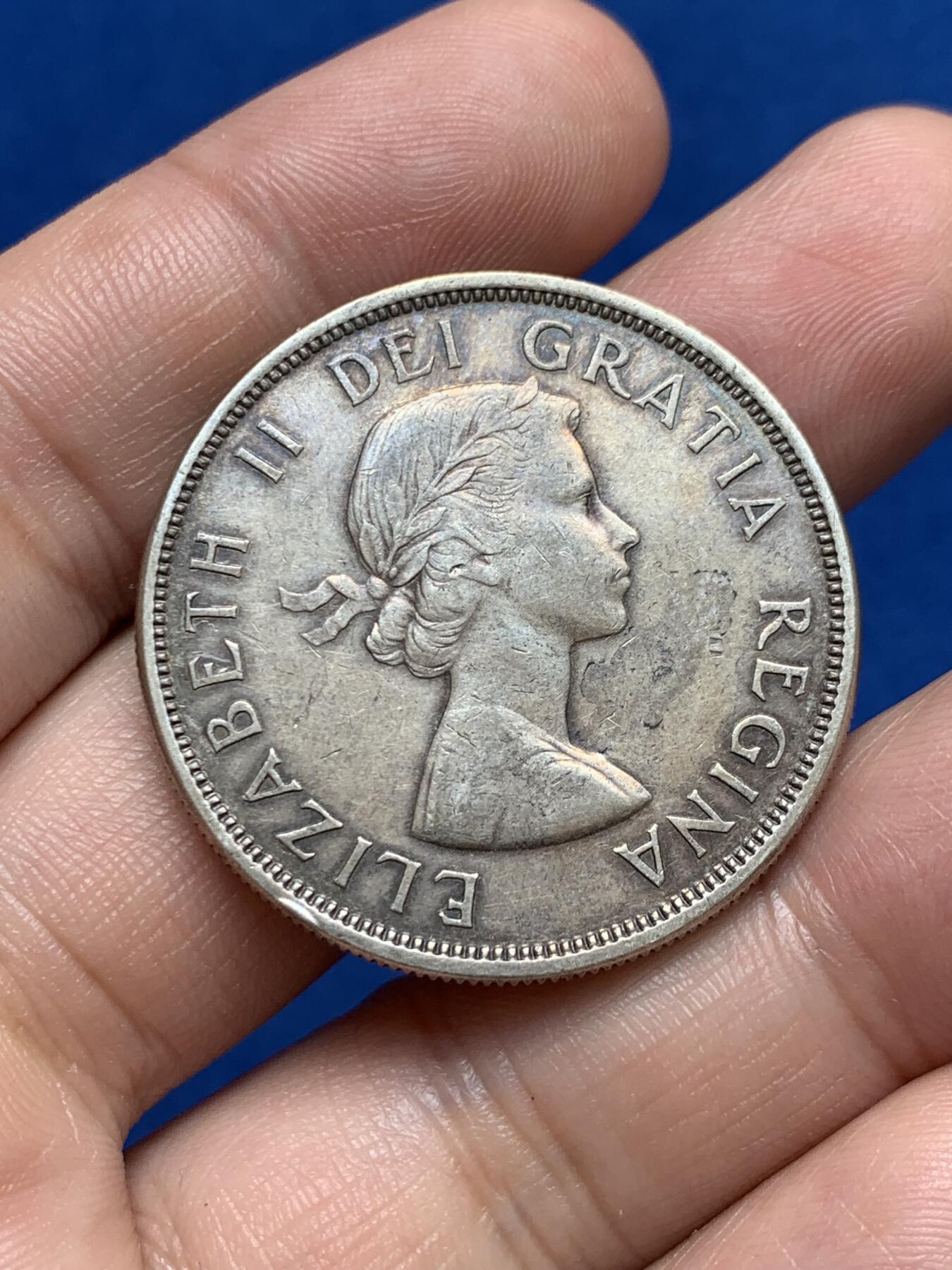 《竞宝斋》第270场- 周日，周一，周二  3场连拍 （全场包邮） 加拿大1961年划船1元银币 原味五彩枪灰包浆味道十足