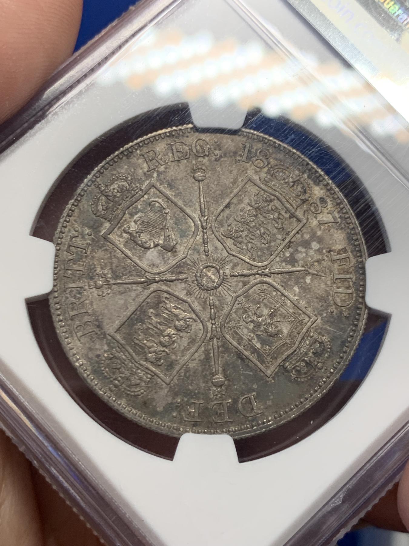 《竞宝斋》第270场- 周日，周一，周二  3场连拍 （全场包邮） NGC MS62 英国1887年维多利亚高冠双弗洛林银币 深彩包浆 底板不错